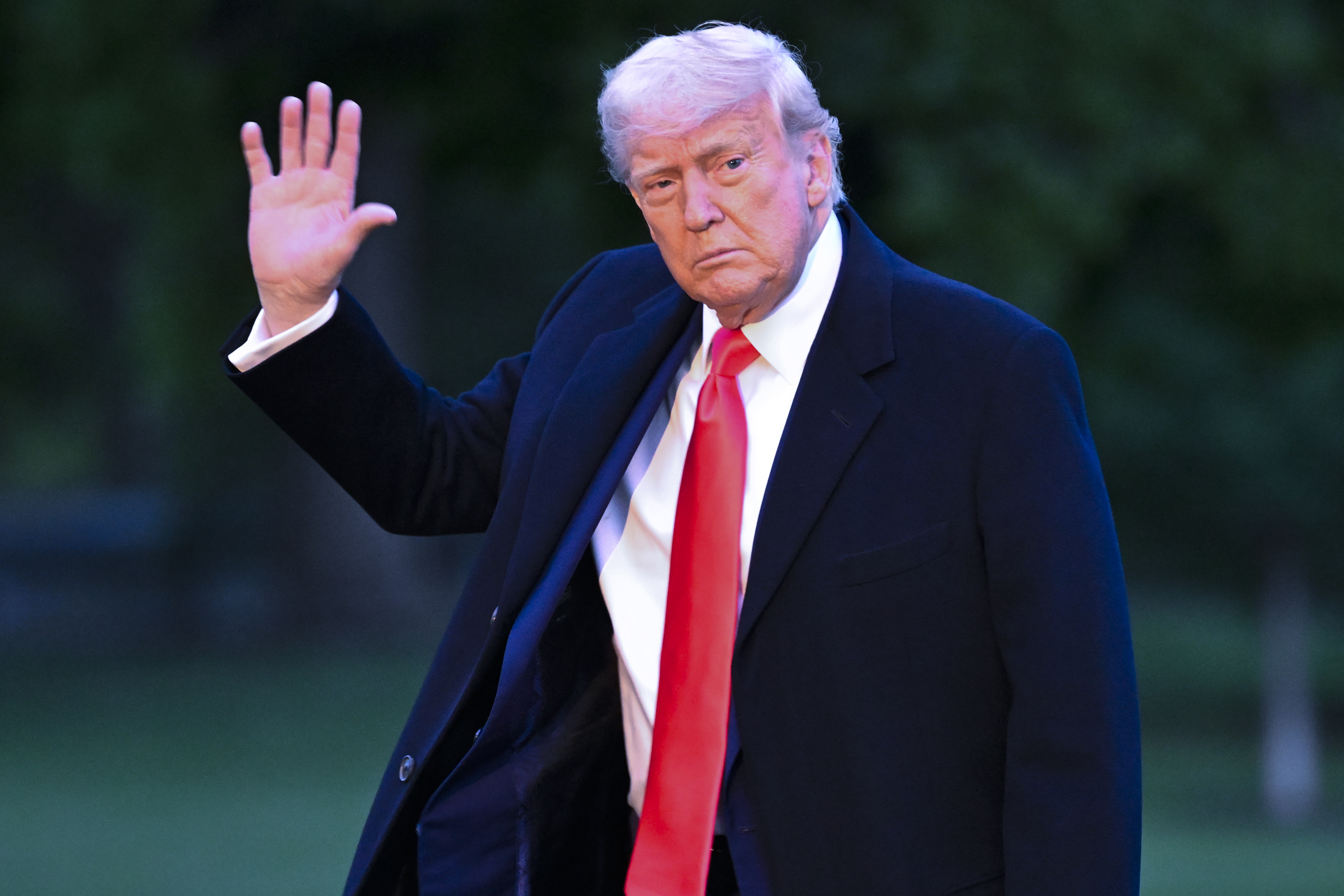 President Donald Trump arrives on the South Lawn of the White House, Thursday, May 22, 2025, in Washington, after attending a crypto dinner at Trump National Golf Club Washington DC. (AP Photo/John McDonnell)