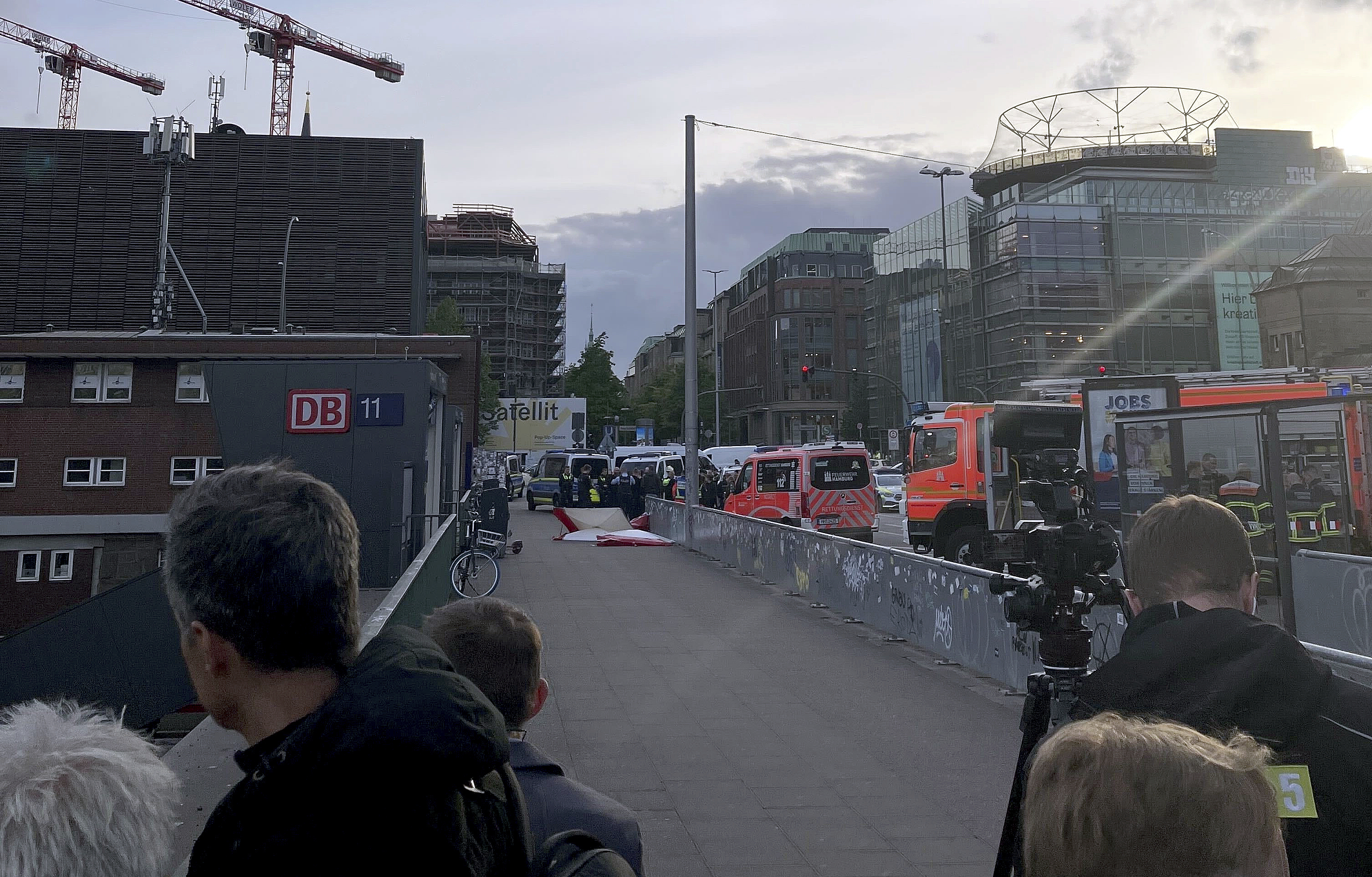 Emergency services at the scene of a stabbing at Hamburg Central Station in Hamburg, Germany, Friday, May 23, 2025. (Lukas Mueller/dpa via AP)