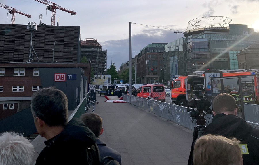 Emergency services at the scene of a stabbing at Hamburg Central Station in Hamburg, Germany, Friday, May 23, 2025. (Lukas Mueller/dpa via AP)