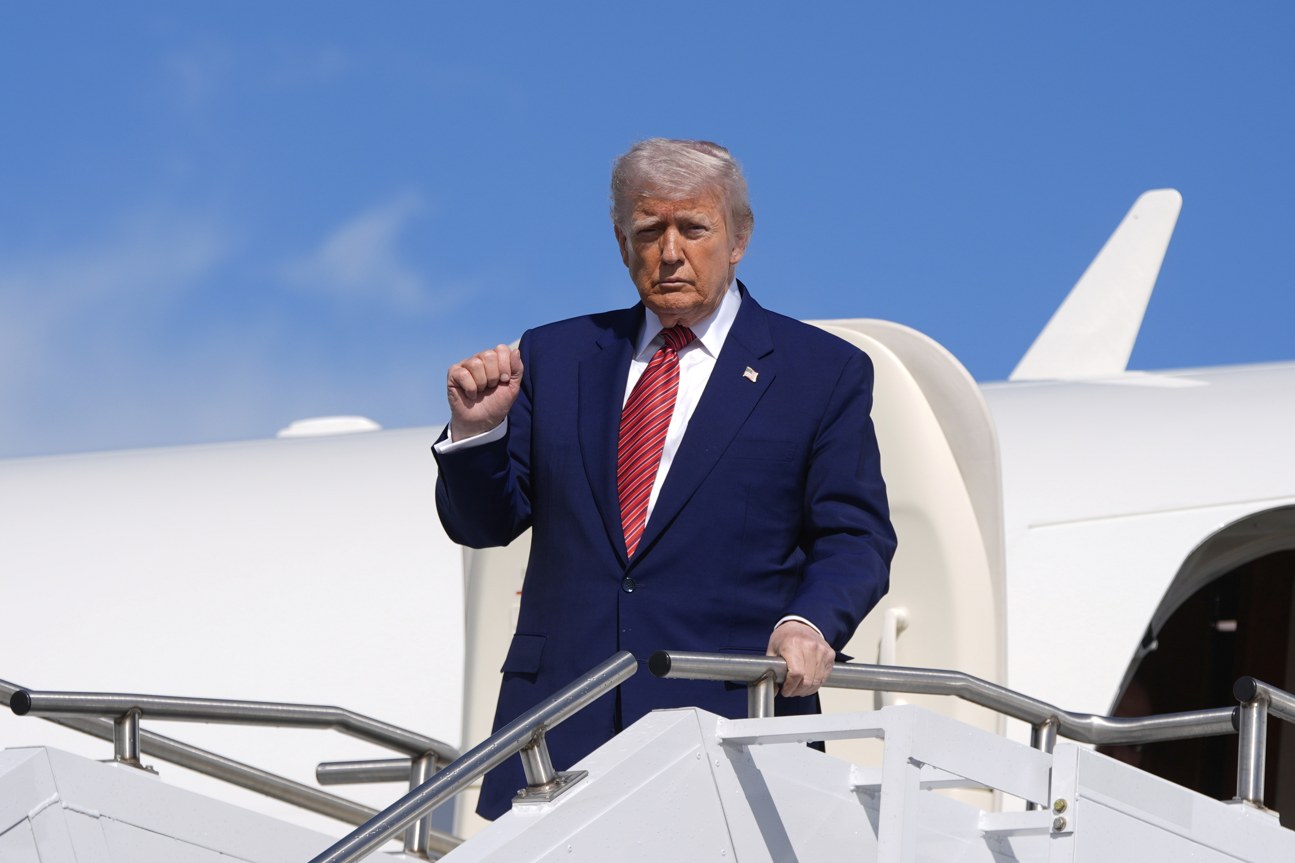 President Donald Trump arrives on Air Force One at Morristown Municipal Airport in Morristown, N.J., Friday, May 23, 2025. (AP Photo/Manuel Balce Ceneta)