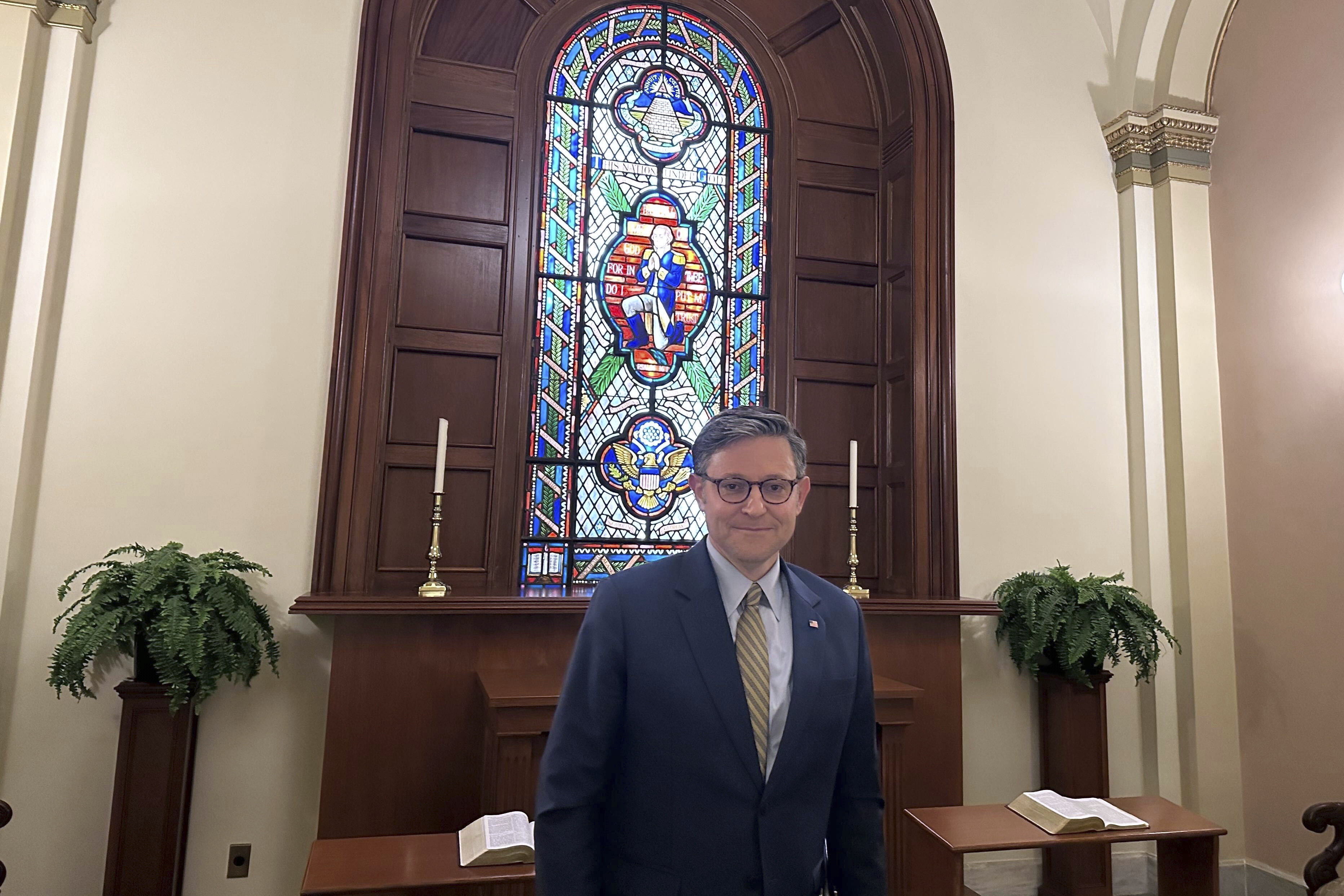 House Speaker Mike Johnson of La., poses for a photo in the Congressional Prayer Room at the U.S. Capitol Wednesday, May 21, 2025, in Washington. (AP Photo/Lisa Mascaro)