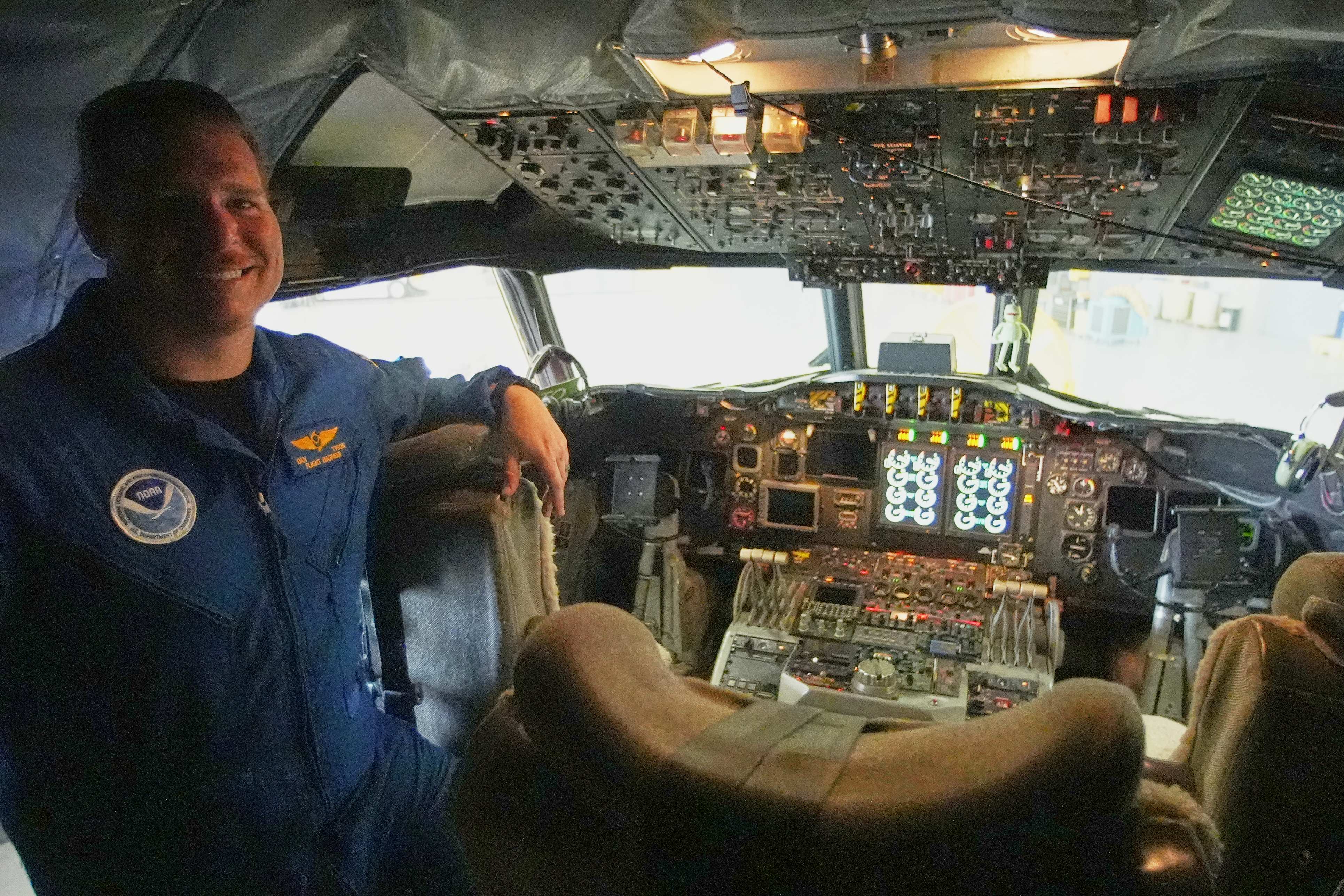 NOAA Flight Engineer Dan Tyson in the cockpit of the Lockheed WP-3D Orion 'Hurricane Hunter' aircraft at the NOAA Aircraft Operations Center Tuesday, May 6, 2025, in Lakeland, Fla. (AP Photo/John Raoux)