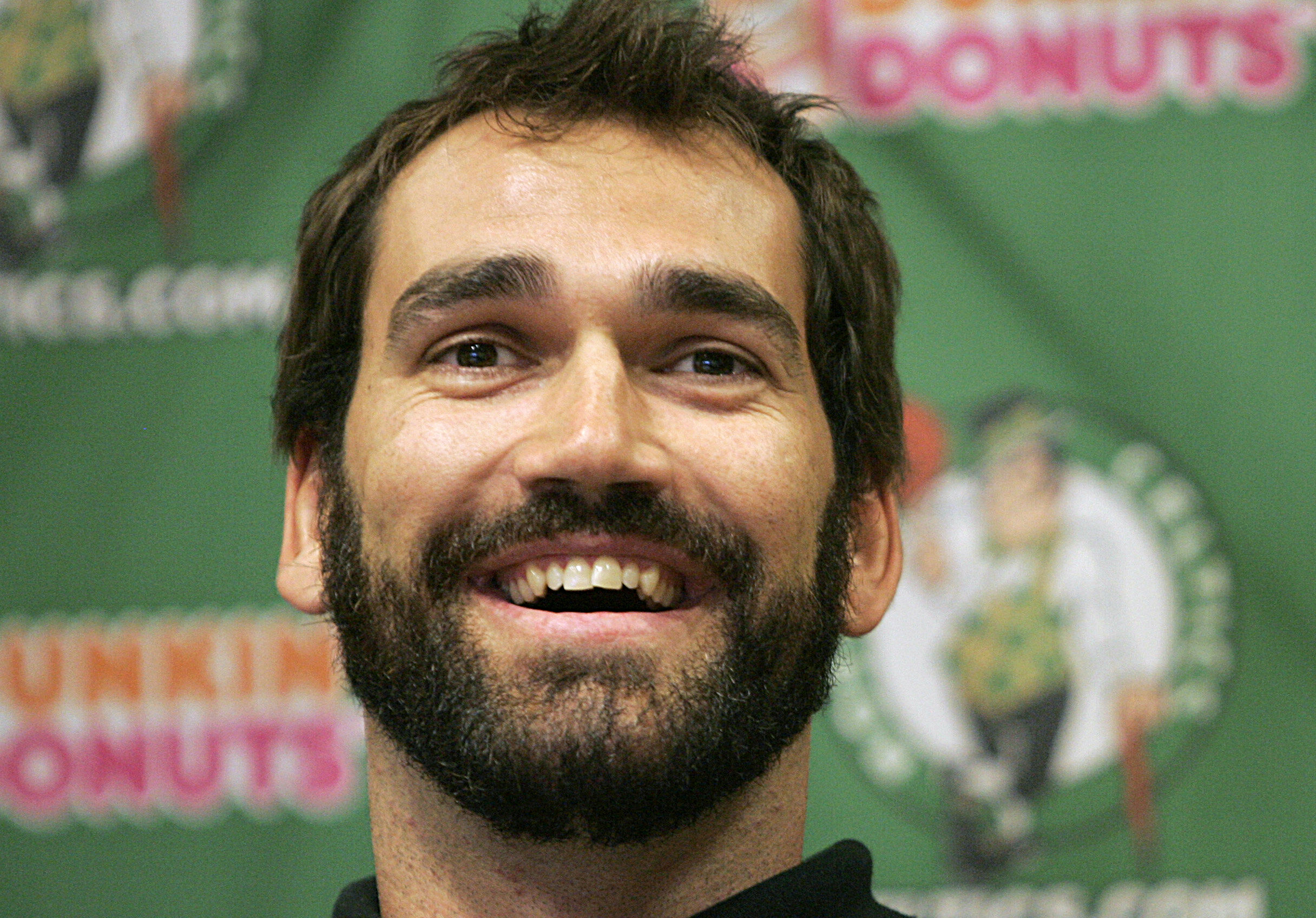 FILE - Boston Celtics center Scot Pollard smiles while facing reporters during a news conference held to introduce the newly signed player at the team's headquarters, in Boston, Thursday, Aug. 9, 2007. (AP Photo/Steven Senne, File)
