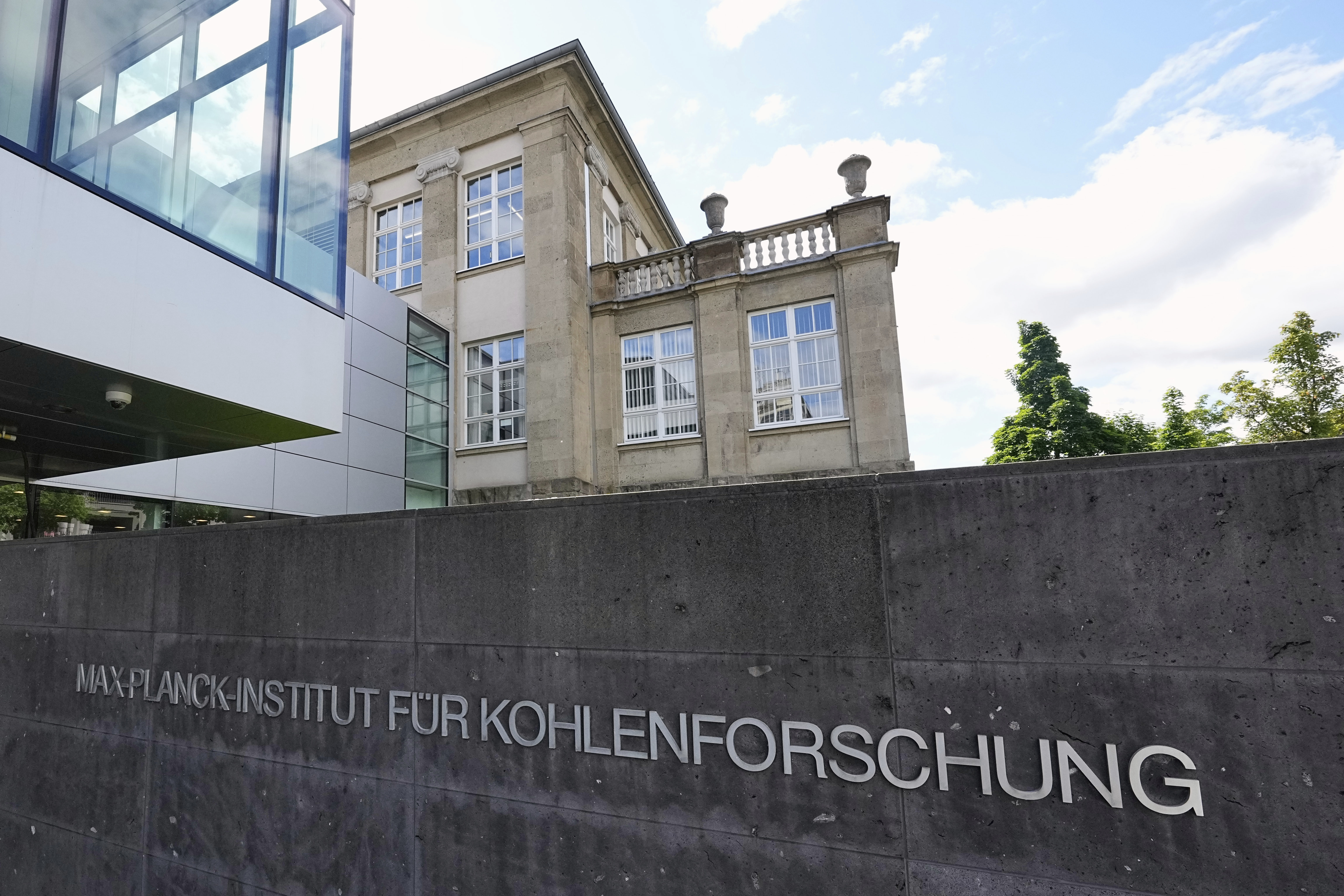 Modern and traditional architecture is seen at the Max Planck Institute for Coal Research in Muelheim, Germany, Friday, May 23, 2025. (AP Photo/Martin Meissner)
