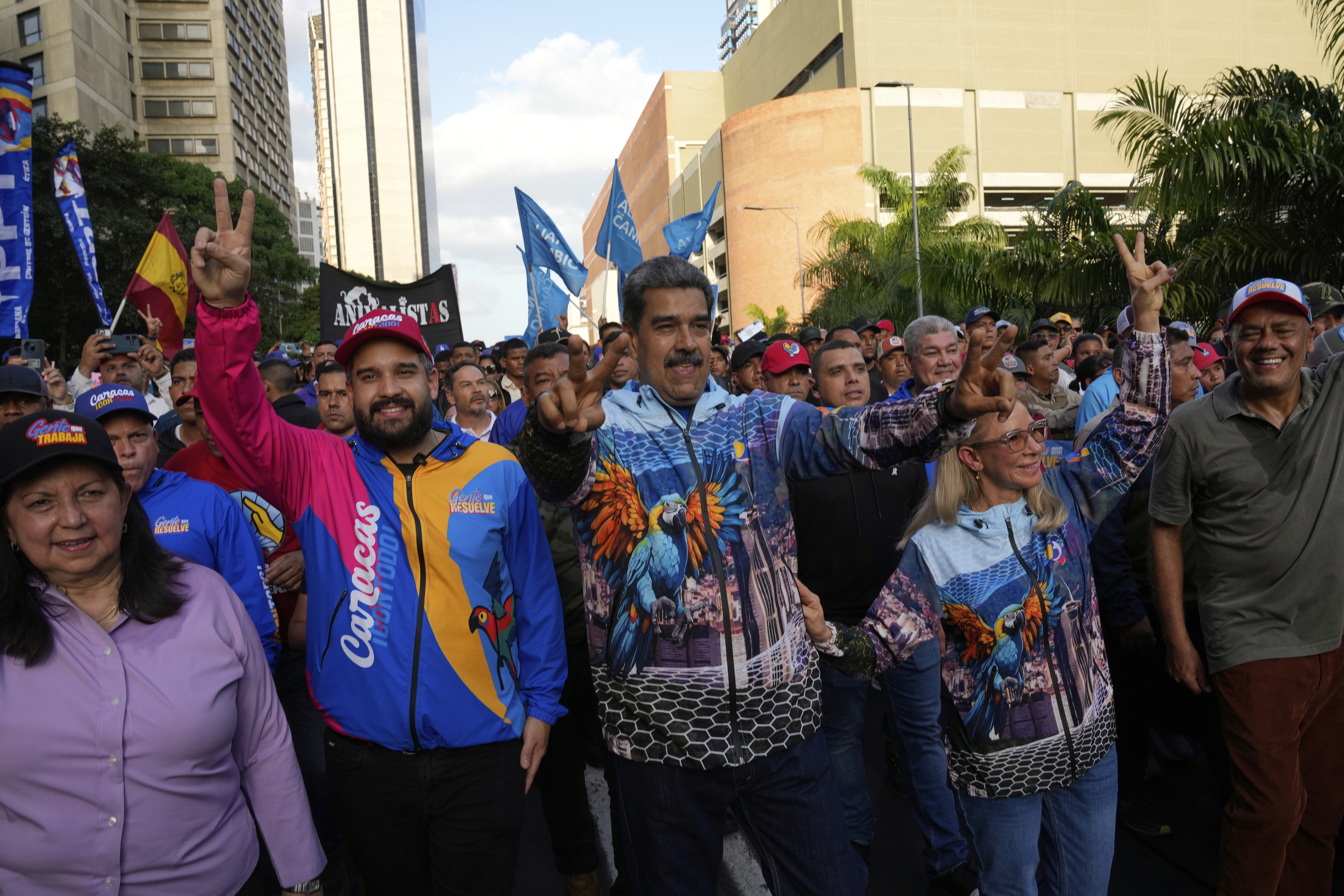 From left to right, Caracas Mayor's Carmen Menendez, Nicolas Maduro Guerra, who's running to represent Caracas as a lawmaker for the National Assembly and also son of Venezuelan President Venezuelan Nicolas Maduro, first lady Cilia Flores and National Assembly Presiden Jorge Rodriguez attend a closing campaign rally for the regional election on May 25, in Caracas, Venezuela, Thursday, May 22, 2025. (AP Photo/Ariana Cubillos)