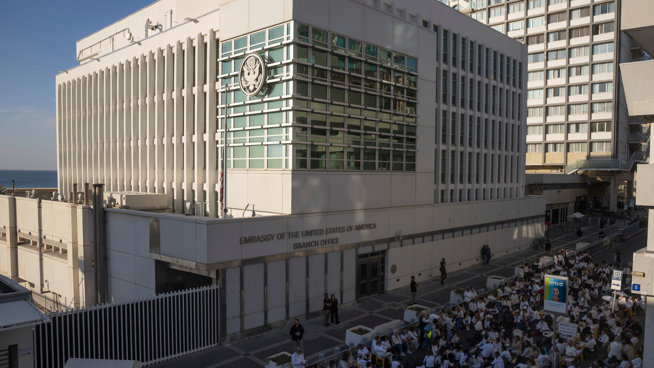 FILE - Activists sit in front of the U.S. Embassy branch office in Tel Aviv, Israel, during a protest, Wednesday, Jan. 8, 2025. (AP Photo/Ohad Zwigenberg, File)