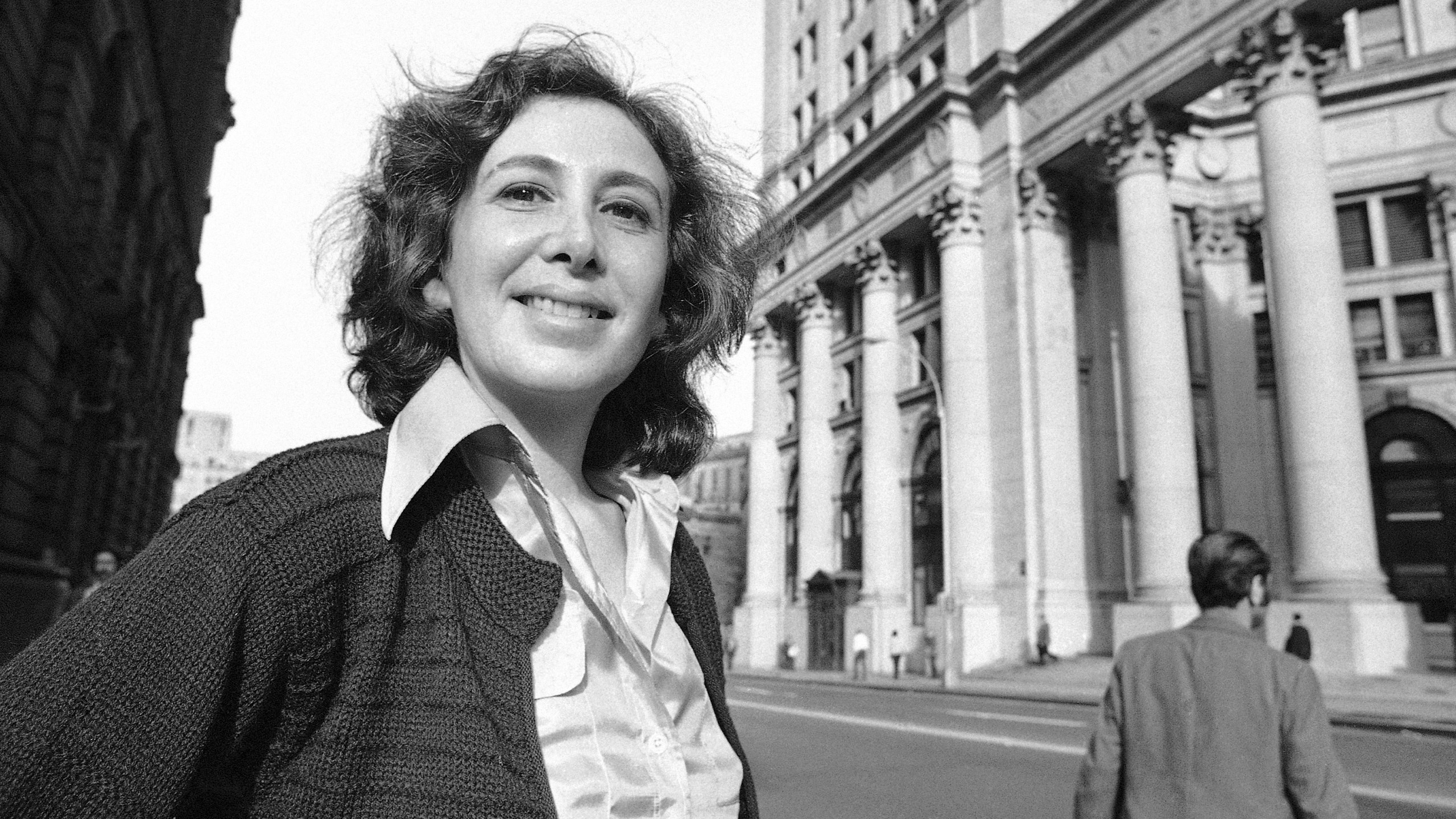 FILE - Susan Brownmiller poses on the streets of lower Manhattan in New York, Oct. 18, 1975. (AP Photo/Suzanne Vlamis, File)