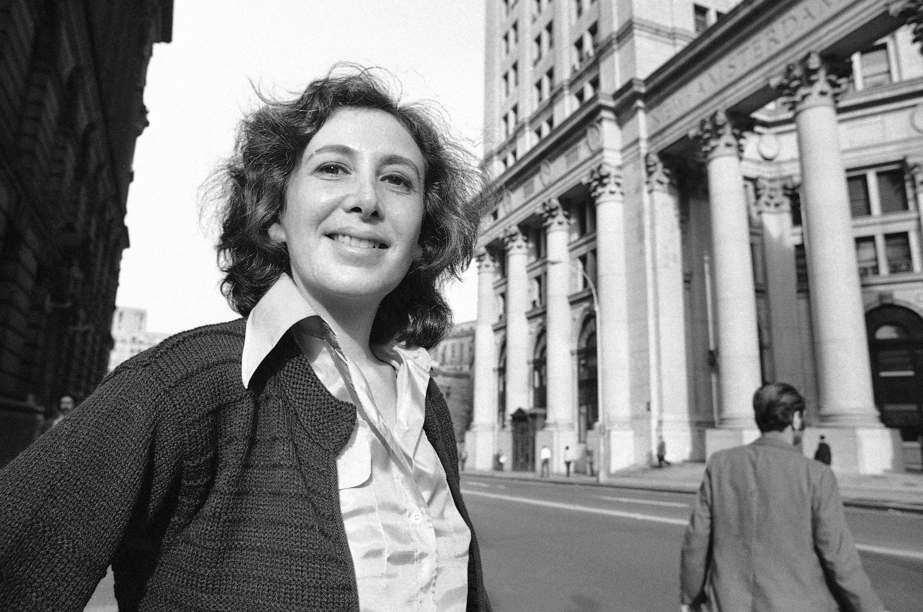 FILE - Susan Brownmiller poses on the streets of lower Manhattan in New York, Oct. 18, 1975. (AP Photo/Suzanne Vlamis, File)
