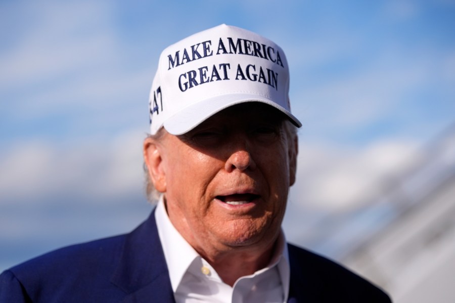 President Donald Trump speaks to reporters before boarding Air Force One at Morristown Municipal Airport in Morristown, N.J., Sunday, May 25, 2025. (AP Photo/Manuel Balce Ceneta)