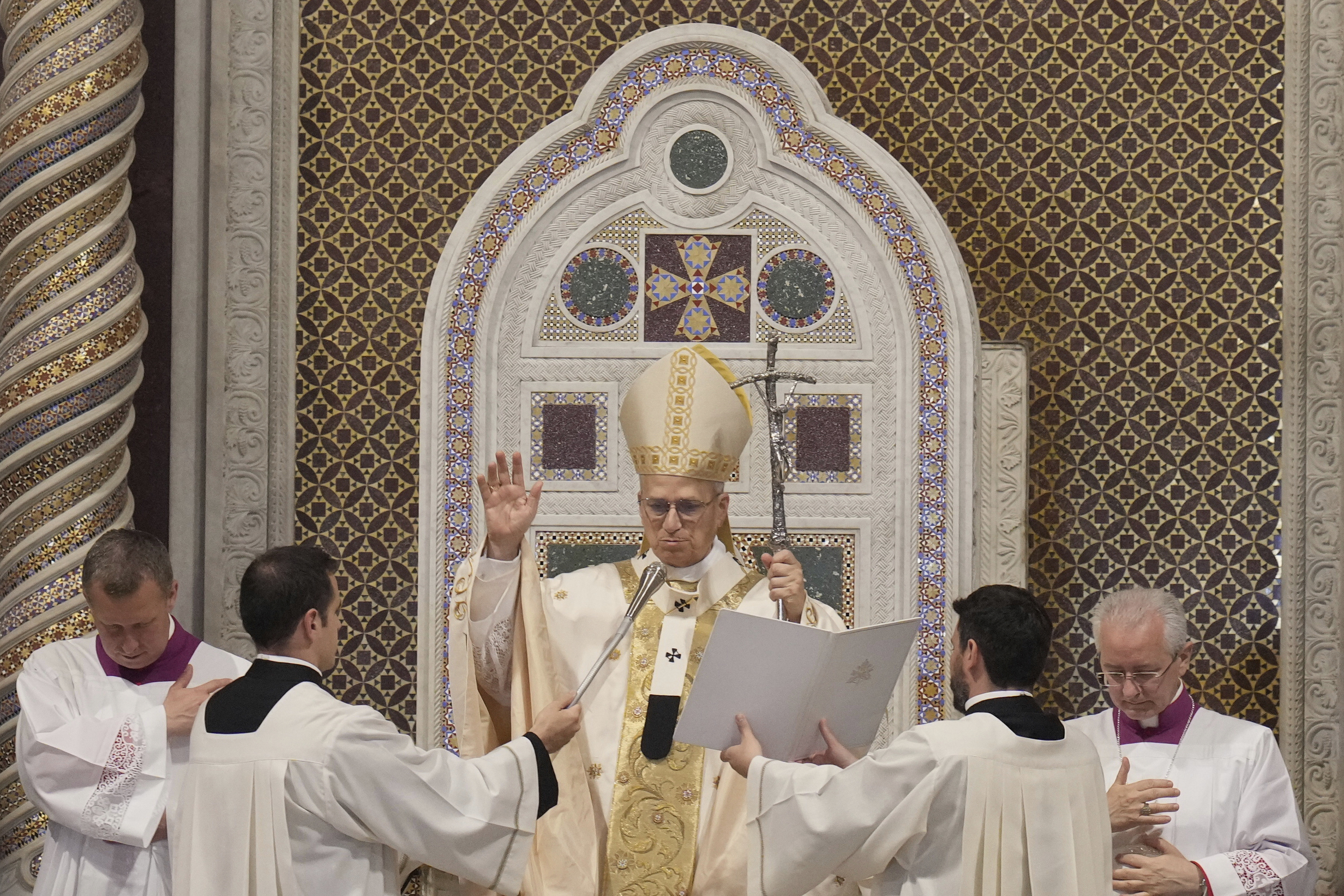 Pope Leo XIV presides over a Mass in the Archbasilica of St. John Lateran and takes possession of the Roman Cathedra, formalizing his role as Bishop of Rome in Rome, Sunday, May 25, 2025. (AP Photo/Gregorio Borgia)