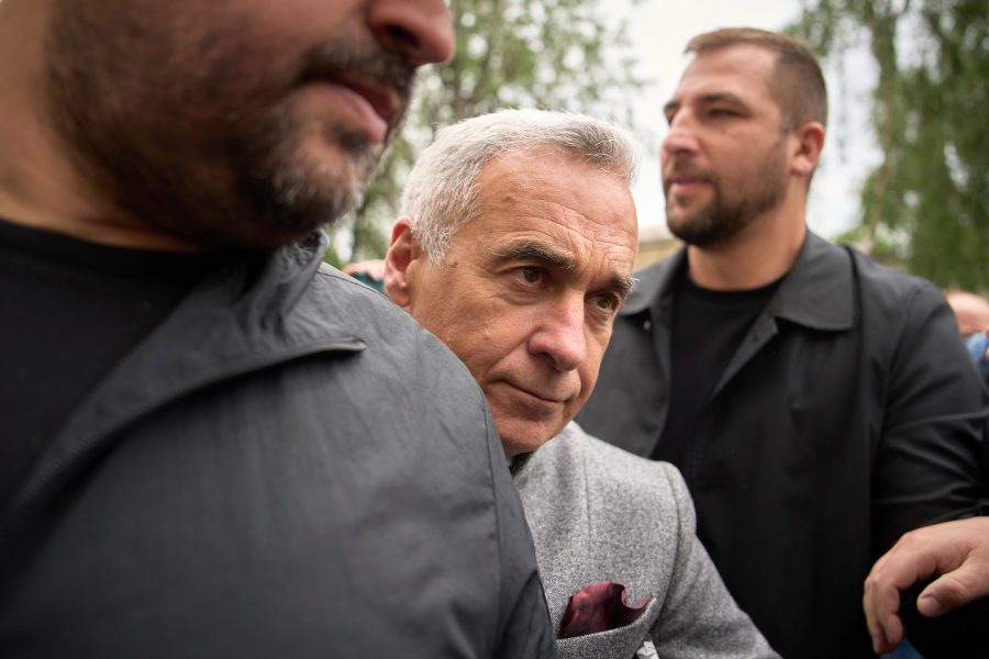 Calin Georgescu, the winner of the first round of last year's annulled election, arrives at a prosecutor's office in Bucharest, Romania, Tuesday, May 27, 2025. (AP Photo/Vadim Ghirda)