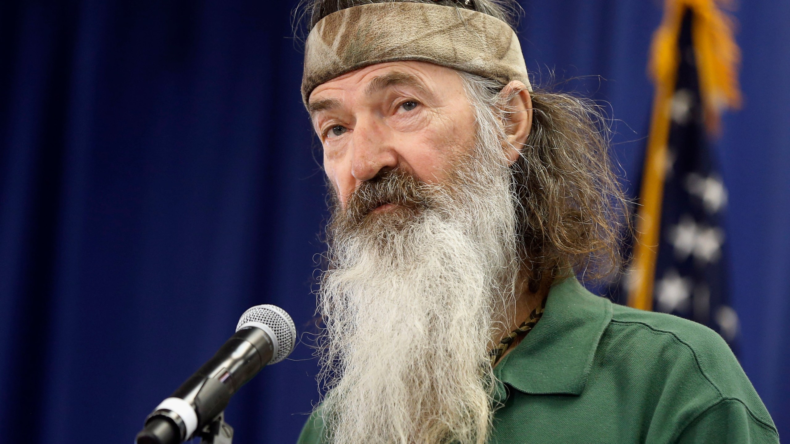 FILE - Phil Robertson of the Duck Dynasty reality television program speaks at a Republican presidential candidate, Sen. Ted Cruz, R-Texas, campaign stop, Feb. 19, 2016, in Myrtle Beach, S.C. (AP Photo/Matt Rourke, File)