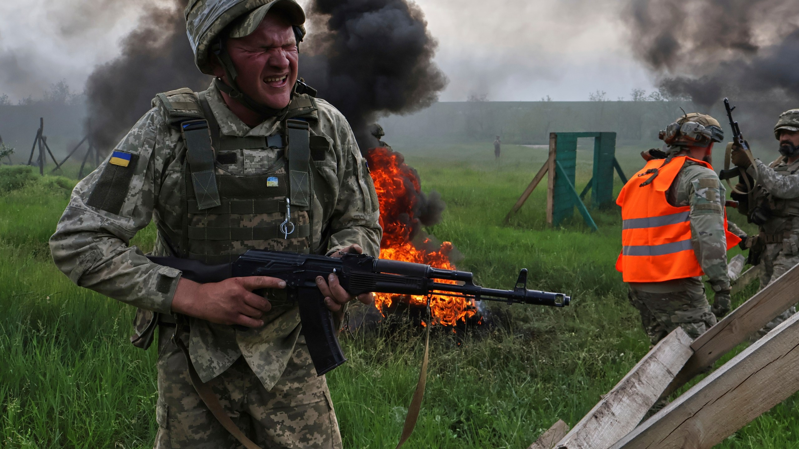 In this photo provided by Ukraine's 65th Mechanized Brigade press service, Ukrainian servicemen attend a military training in Zaporizhzhia region, Ukraine, Monday, May 26, 2025. (Andriy Andriyenko/Ukraine's 65th Mechanized Brigade via AP)