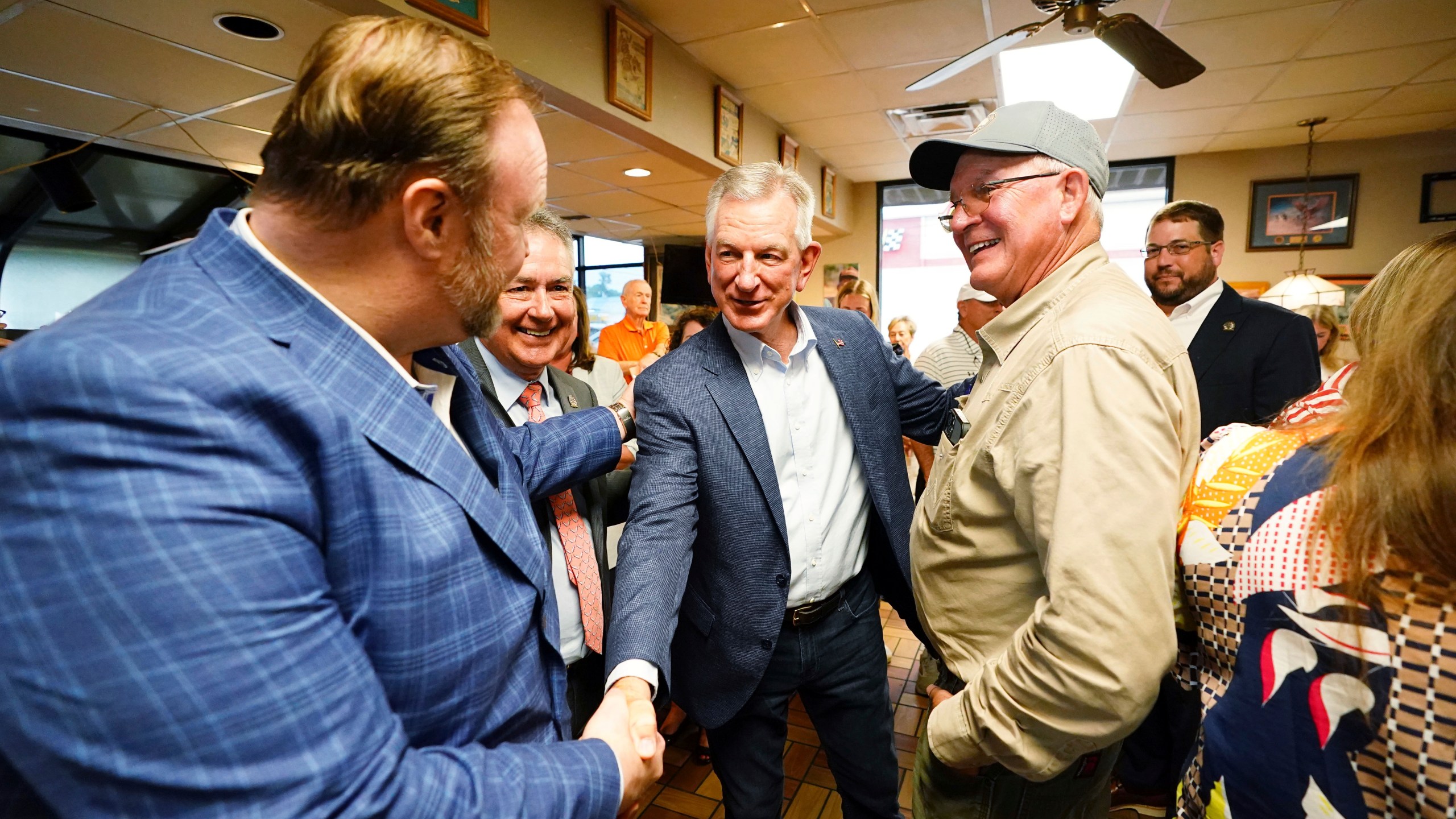U.S. Sen. Tommy Tuberville, R-Ala., greets supporters following announcing his plans to run for the governor of Alabama in 2026, Tuesday May 27, 2025 at Byron's Smokehouse in Auburn, Ala. (AP Photo/ John David Mercer)