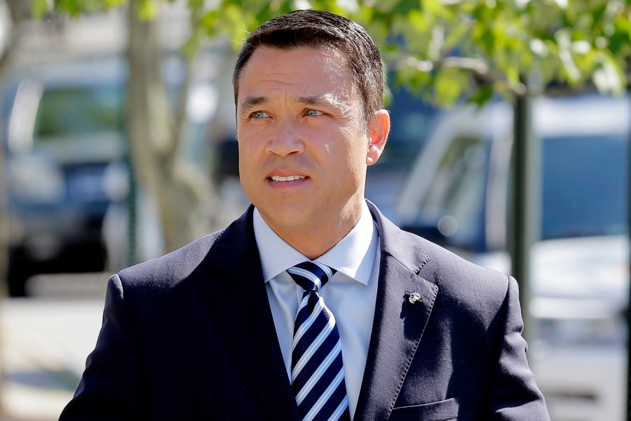 FILE — Former Rep. Michael Grimm arrives to his polling site in the Staten Island borough of New York, June 26, 2018. (AP Photo/Seth Wenig, File)