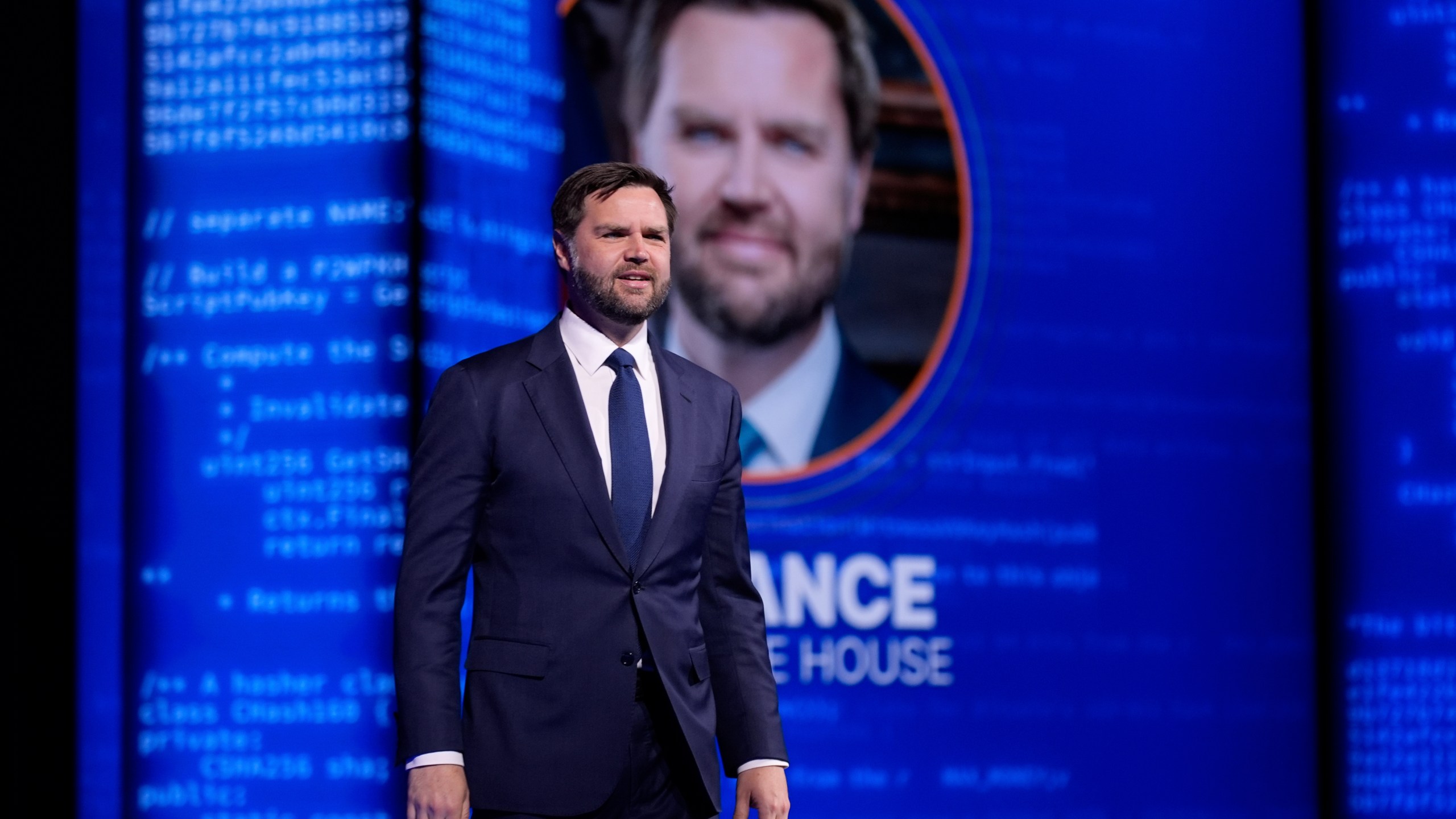 Vice President JD Vance walks on stage to speak at Bitcoin 2025, Wednesday, May 28, 2025, in Las Vegas. (AP Photo/John Locher)