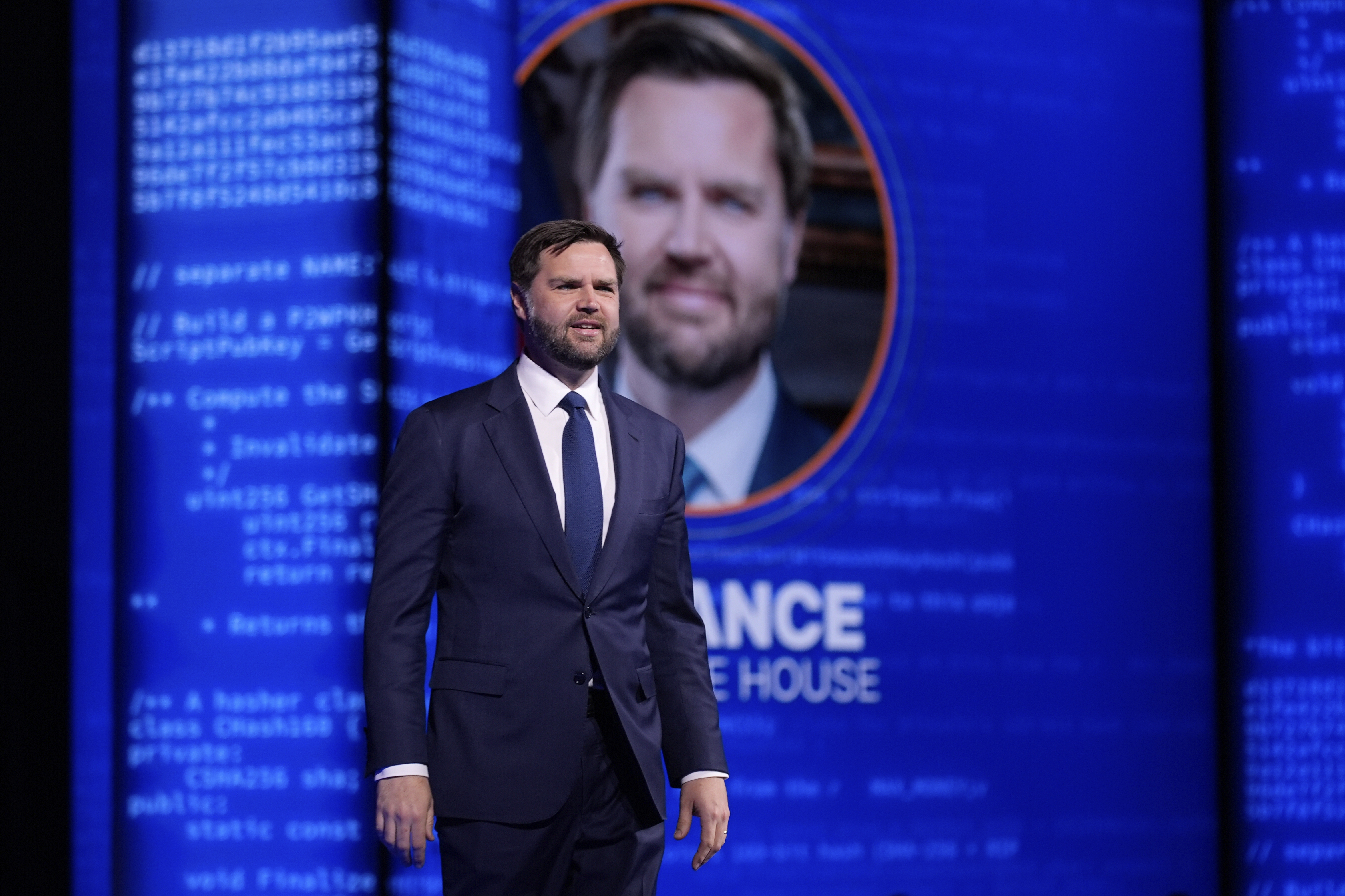 Vice President JD Vance walks on stage to speak at Bitcoin 2025, Wednesday, May 28, 2025, in Las Vegas. (AP Photo/John Locher)