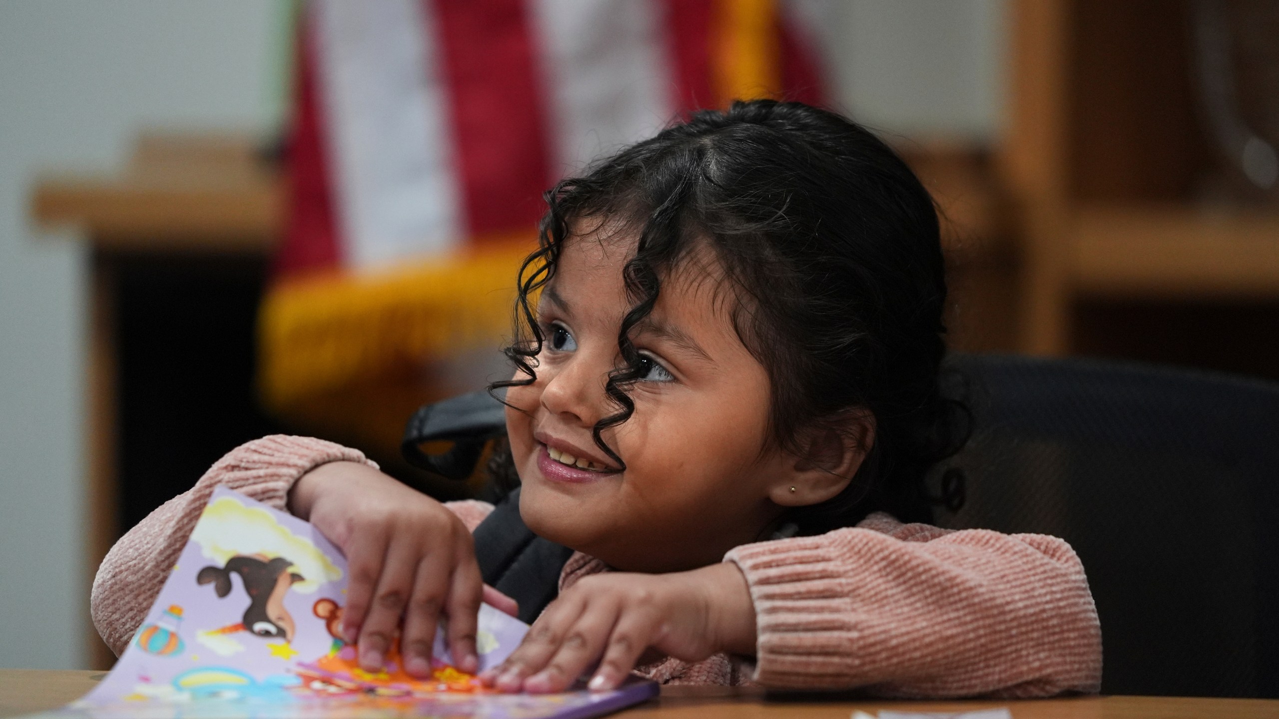 A 4-year-old Mexican girl, who has short bowel syndrome, attends a news conference in Los Angeles, Wednesday, May 28, 2025, after her and her mother's humanitarian parole was terminated and they were ordered to self-deport. (AP Photo/Jae C. Hong)