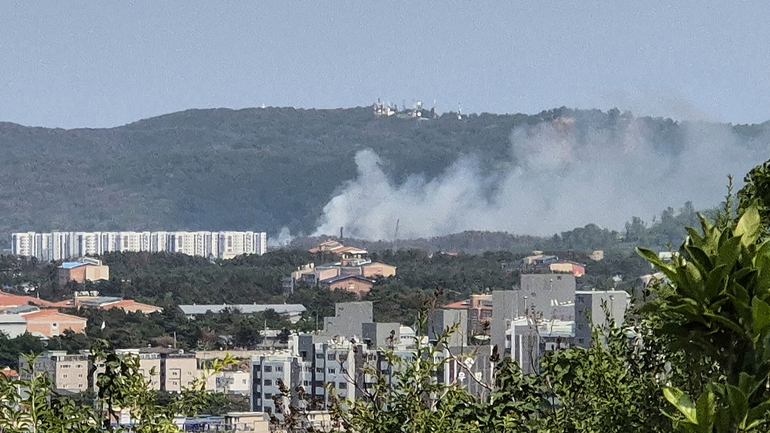 Smoke rises from a mountain in Pohang, South Korea, where a Navy patrol plane carrying four people crashed on Thursday, May 29, 2025. (Son Dae-seong/Yonhap via AP)