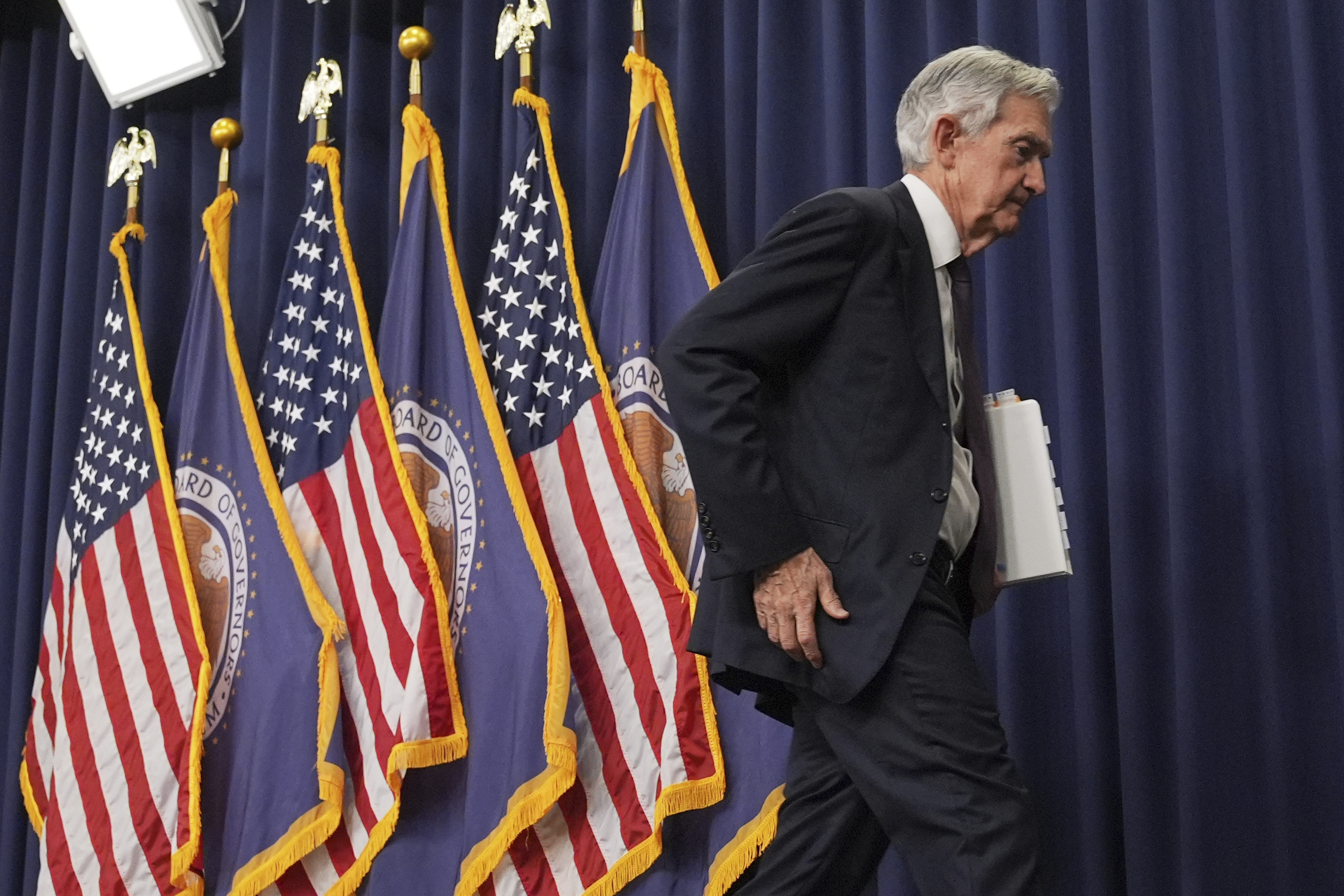 Federal Reserve Chairman Jerome Powell walks off following a news conference following the Federal Open Market Committee meeting, Wednesday, May 7, 2025, at the Federal Reserve in Washington. (AP Photo/Jacquelyn Martin)