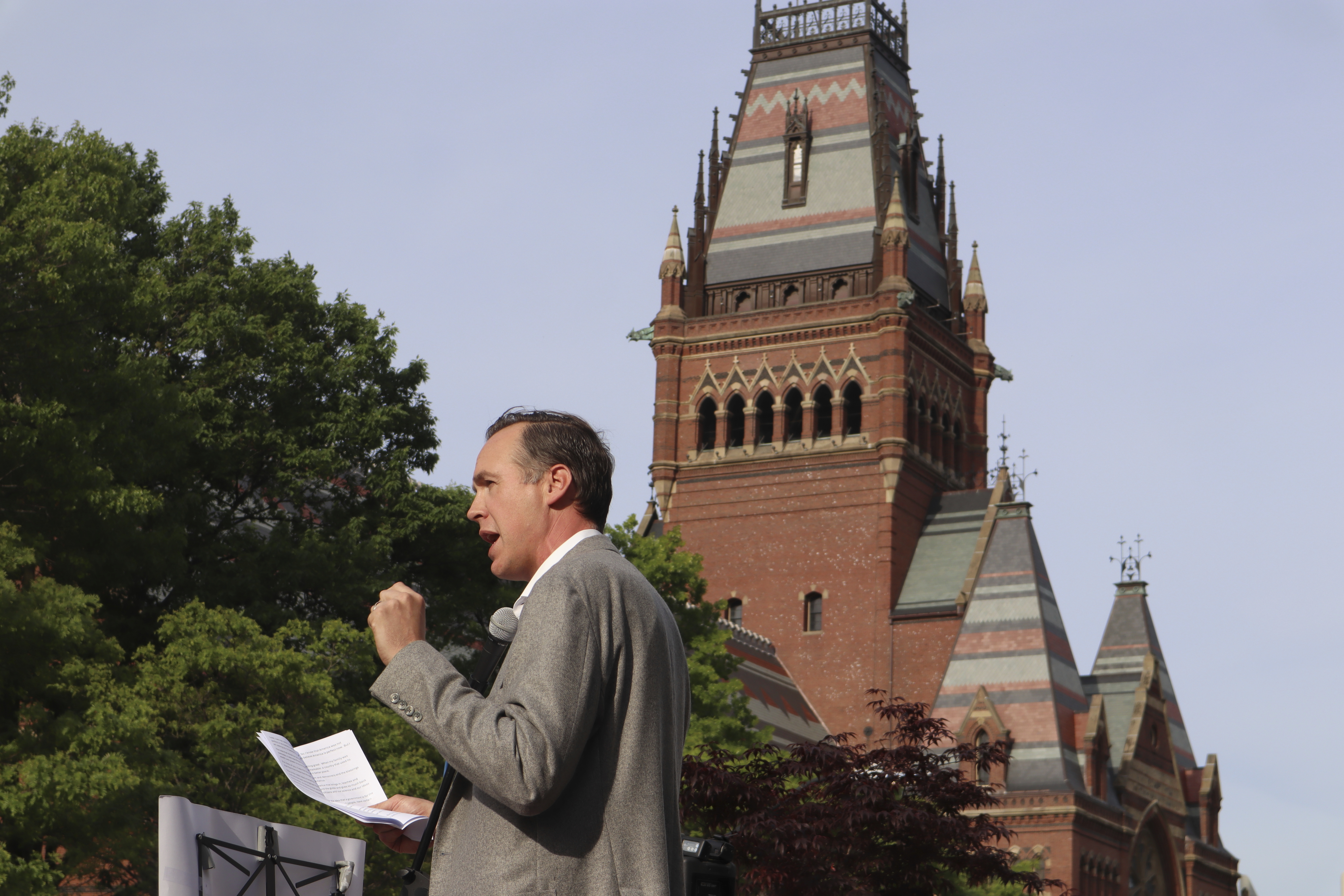 Ryan Enos, a government professor at Harvard University, speaks at a protest against President Donald Trump's recent sanctions against Harvard in front of Science Center Plaza on Tuesday, May 27, 2025, in Cambridge, Mass. (AP Photo/Leah Willingham)