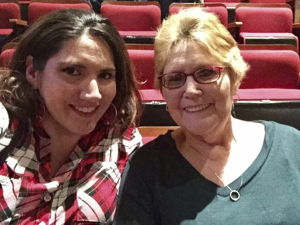 In this 2016 image provided by Misti Leon, left, she sits with her mom, Juliana Leon. Misti Leon is suing several oil and gas companies in one of the nation’s first wrongful-death claims seeking to hold the fossil fuel industry accountable for its role in the changing climate. (Misti Leon via AP)