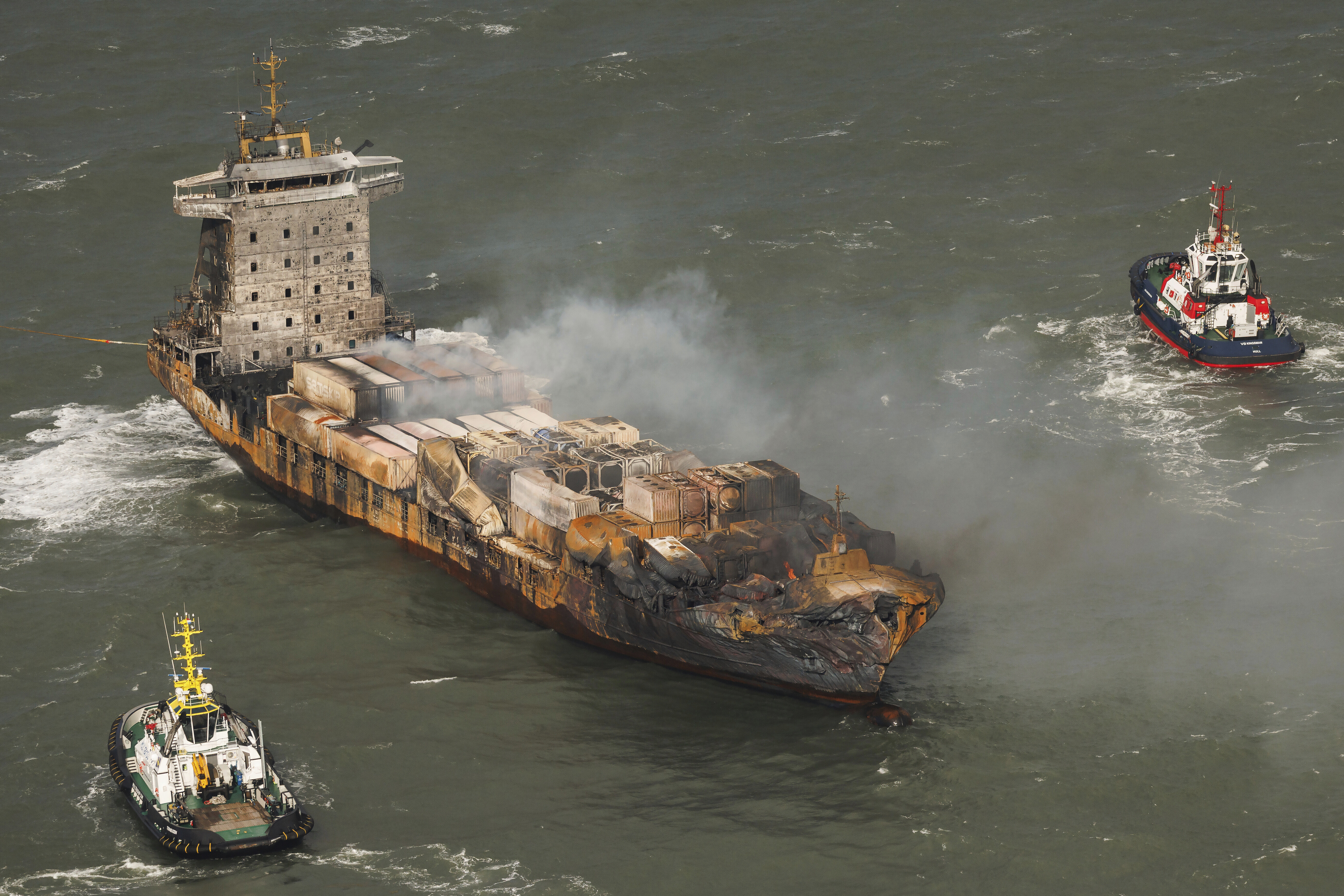 FILE - Smoke billows from the MV Solong cargo ship in the North Sea, off the Yorkshire coast, Tuesday, March 11, 2025, in England. (Dan Kitwood/Pool Photo via AP, File)