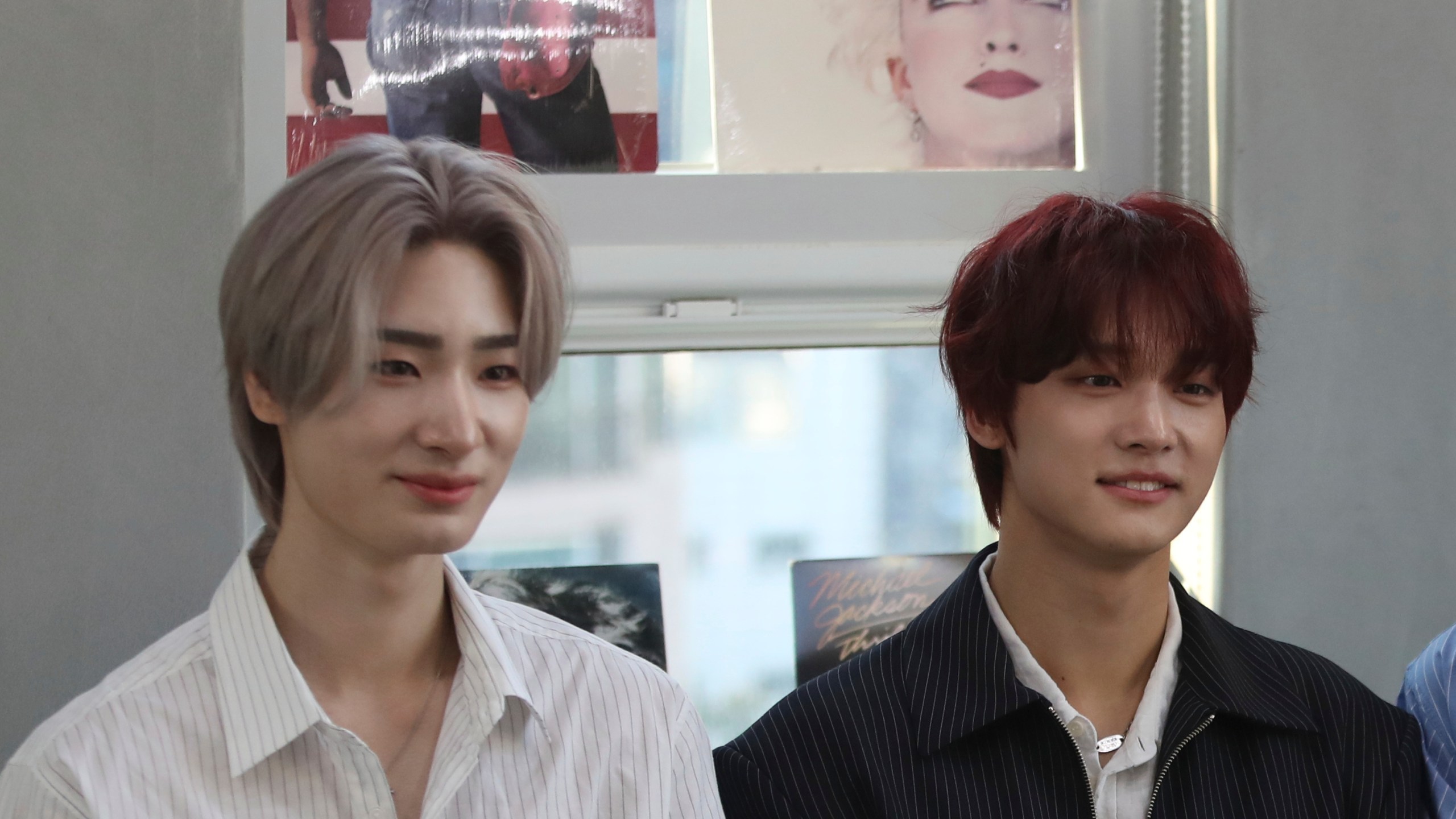 Members of K-pop band Big Ocean, Jiseok, left, and PJ, participate in an interview with The Associated Press in Seoul, South Korea, April 15, 2025. (AP Photo/Juwon Park)