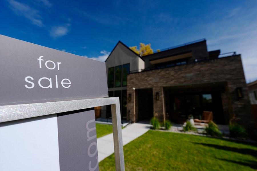 FILE - A sale sign stands outside a home on the market Thursday, Oct. 17, 2024, in the east Washington Park neighborhood of Denver. (AP Photo/David Zalubowski, File)