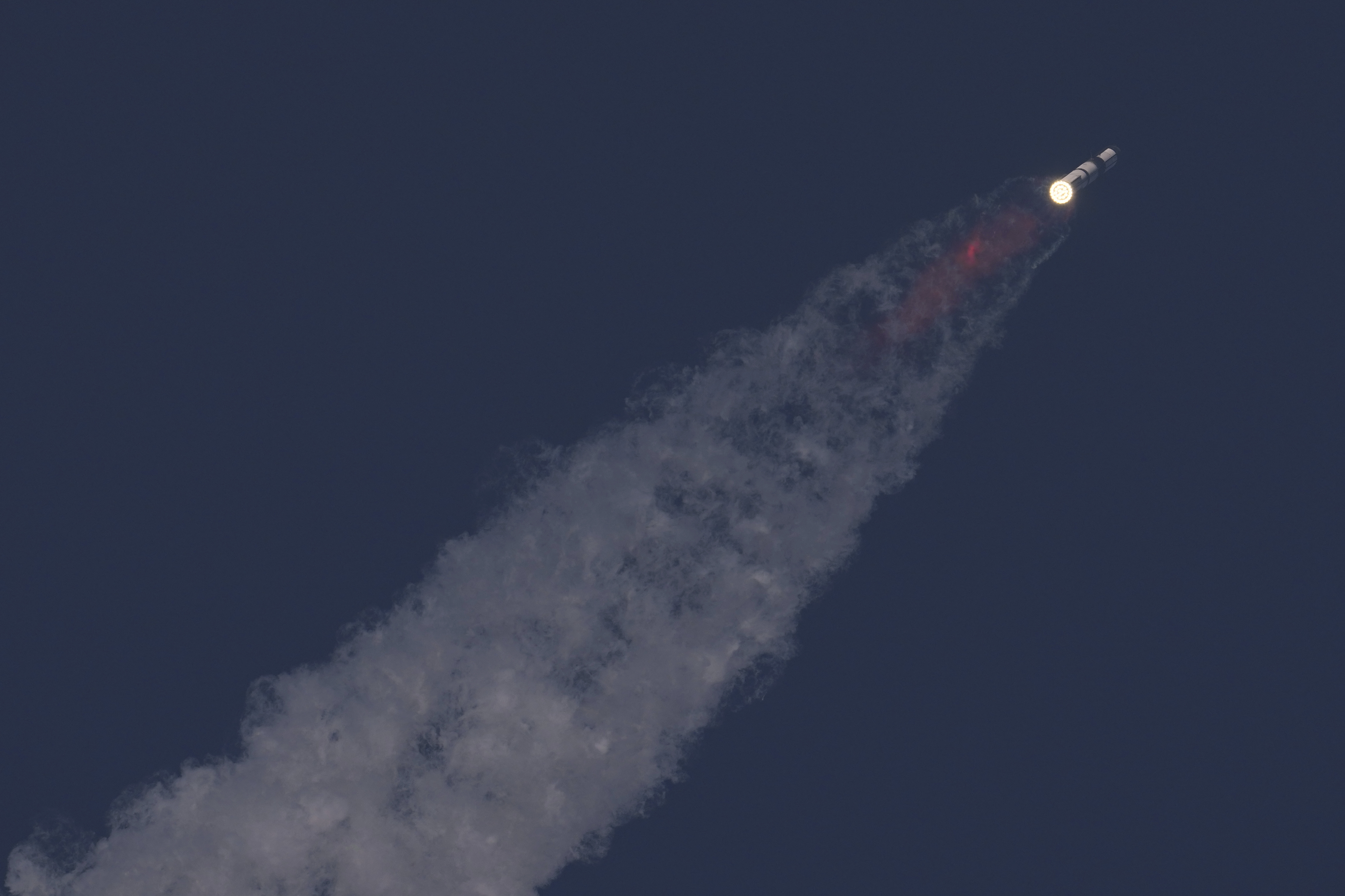 SpaceX's mega rocket Starship makes a test flight from Starbase, Texas, Tuesday, May 27, 2025. (AP Photo/Eric Gay)