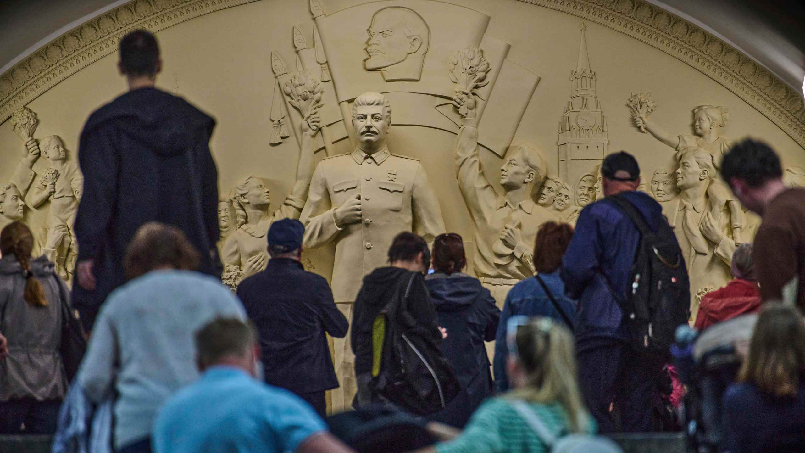 FILE - Passengers walk in front of a monument to Soviet leader Josef Stalin at the Taganskaya subway station in Moscow, Russia, on Wednesday, May 21, 2025. (AP Photo/Alexander Zemlianichenko, File)