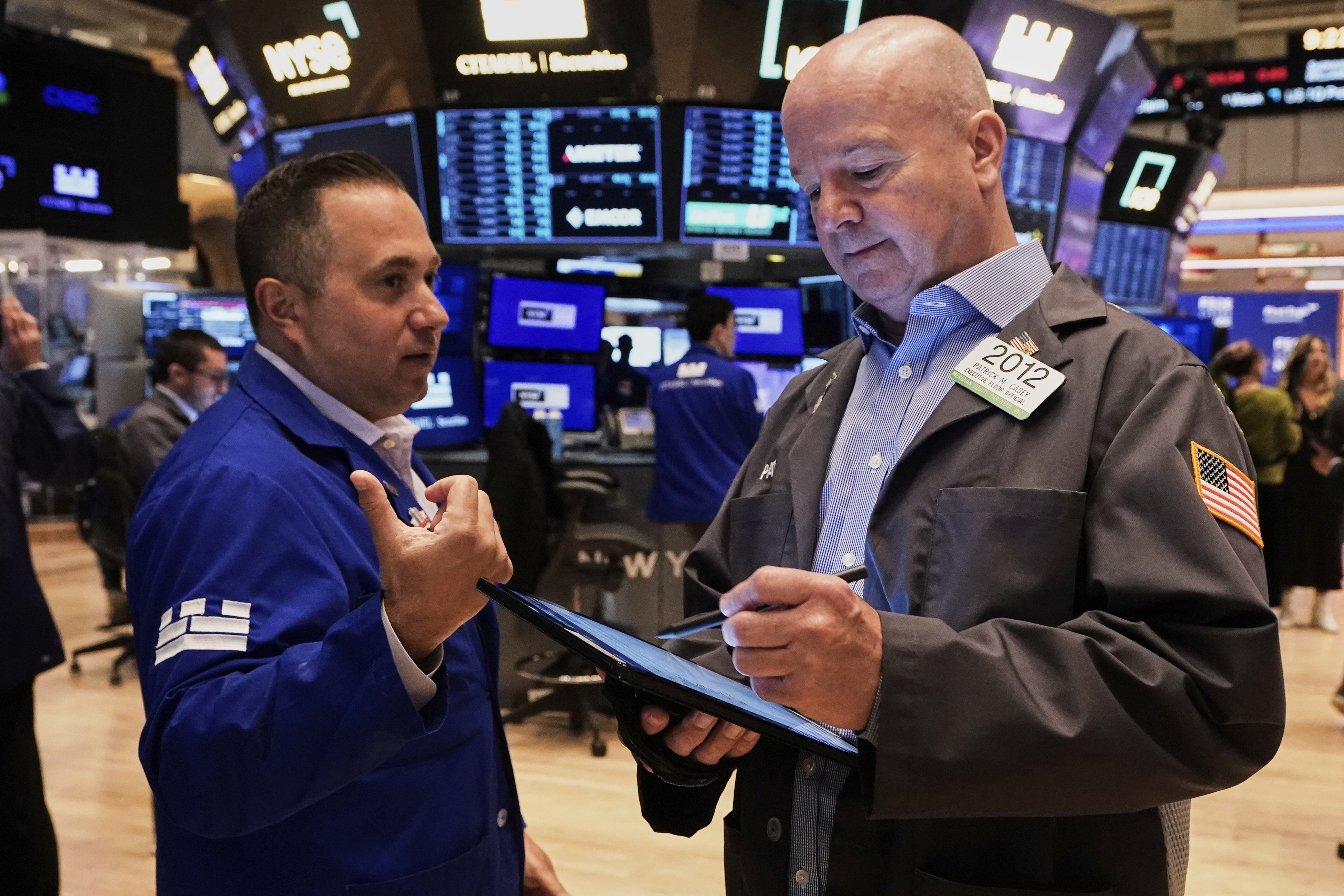 Specialist Gennaro Saporito, left, and trader Patrick Casey work on the floor of the New York Stock Exchange, Thursday, May 29, 2025. (AP Photo/Richard Drew)