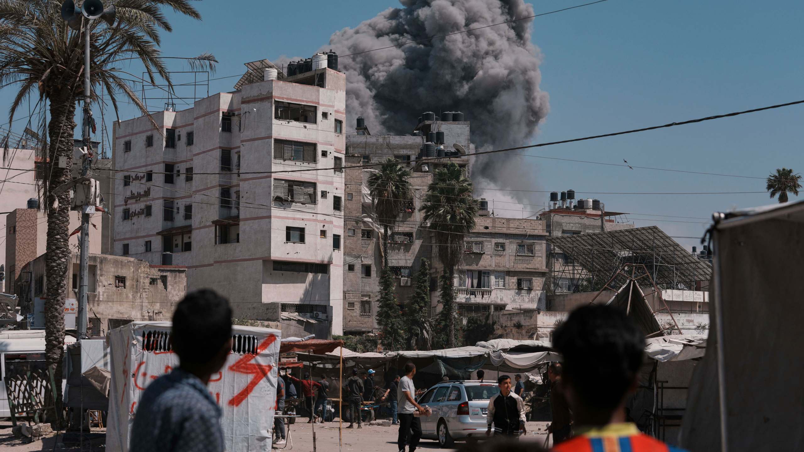 Smoke rises in the sky following an Israeli airstrike in Gaza City, Friday, May 30, 2025. (AP Photo/Jehad Alshrafi)