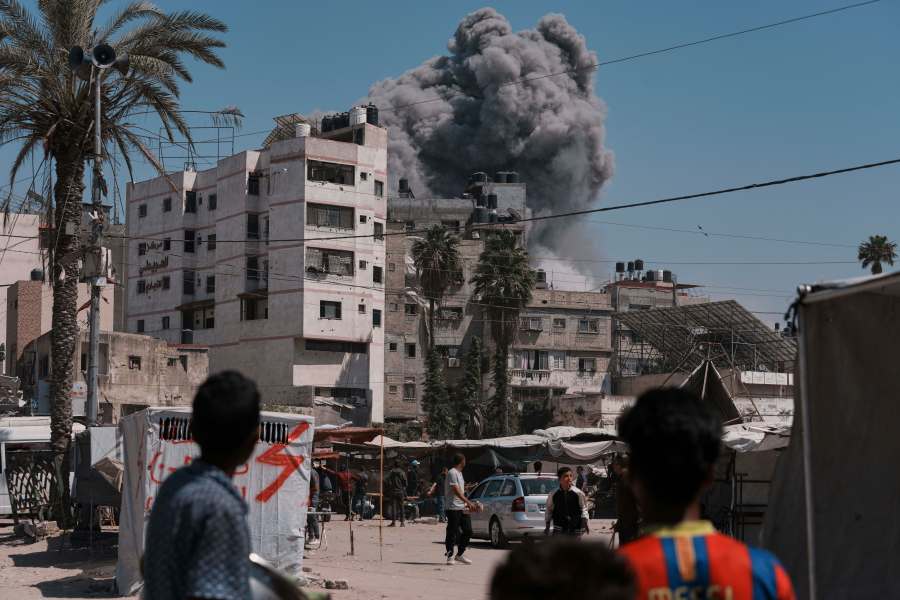 Smoke rises in the sky following an Israeli airstrike in Gaza City, Friday, May 30, 2025. (AP Photo/Jehad Alshrafi)