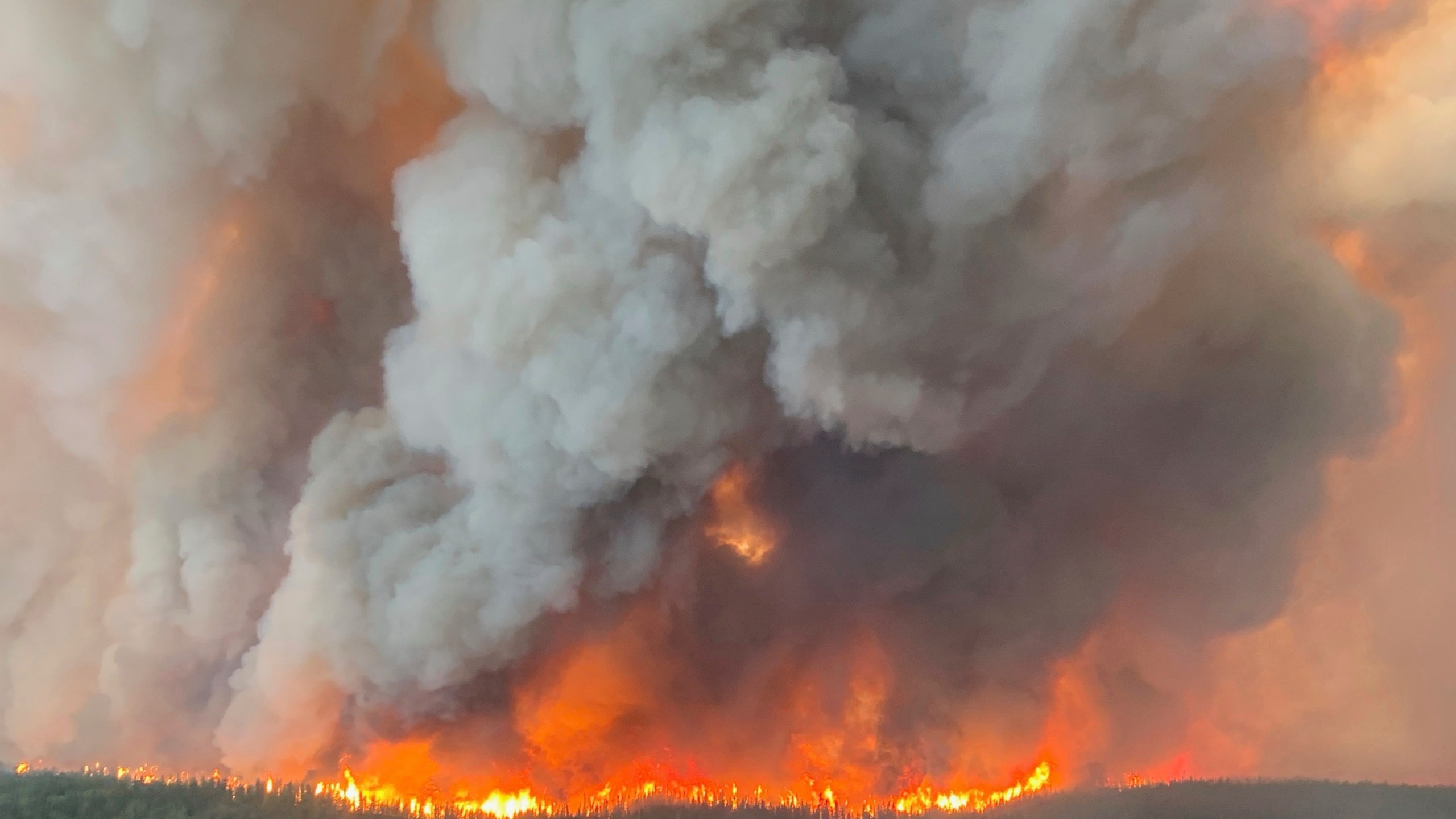 This photo provided by the Manitoba government shows wildfires in Sherridon, Manitoba, Canada on Tuesday, May 27, 2025. (Manitoba government via AP)