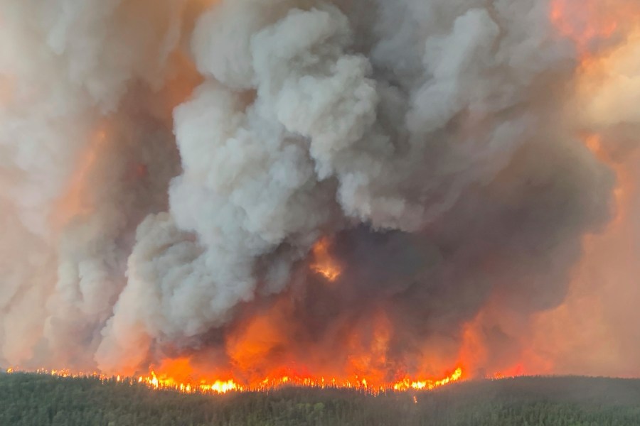 This photo provided by the Manitoba government shows wildfires in Sherridon, Manitoba, Canada on Tuesday, May 27, 2025. (Manitoba government via AP)