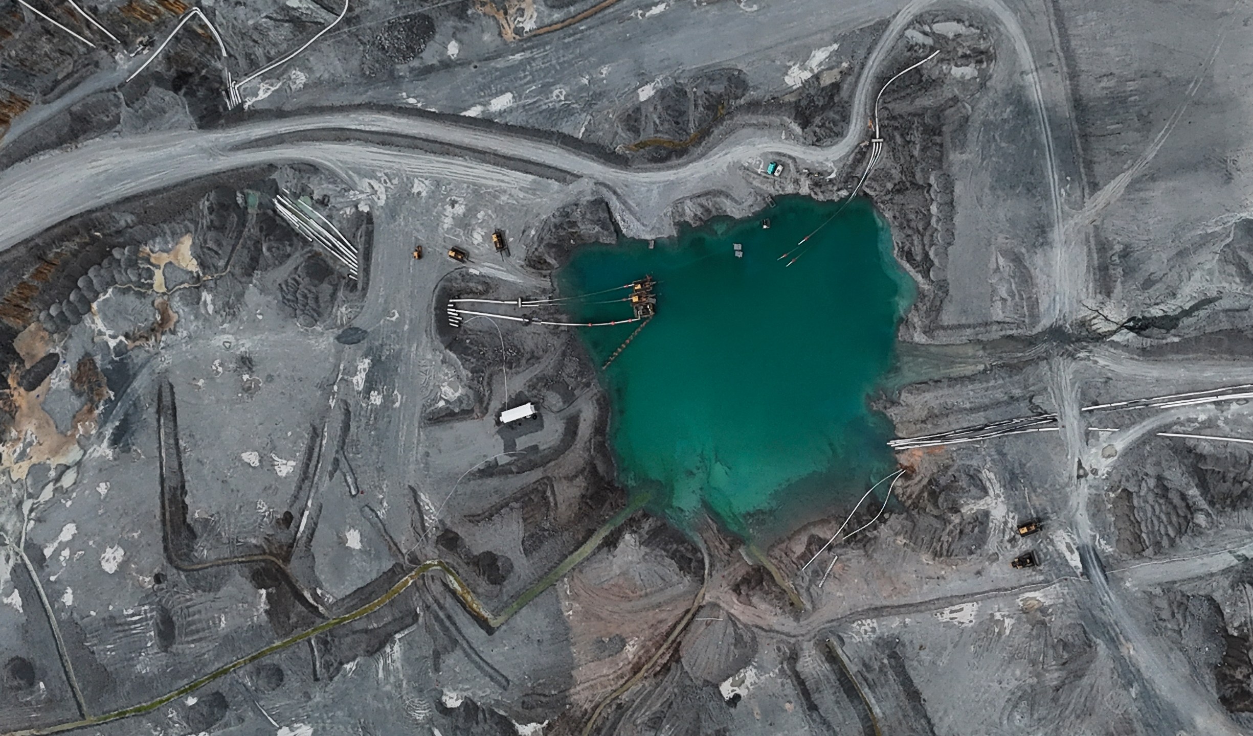 FILE - An aerial view of a sump at the Cobre Panama copper open-pit mine during a press tour of the mine, owned by Canada's First Quantum Minerals, in Donoso, Panama, March 21, 2025. (AP Photo/Matias Delacroix, File)