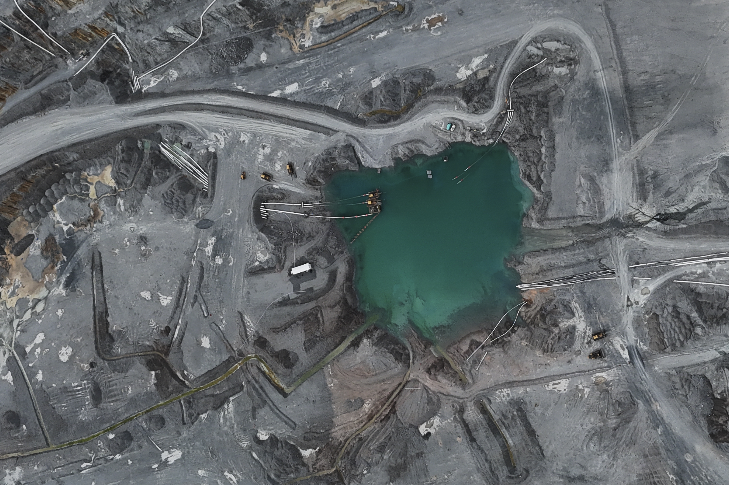 FILE - An aerial view of a sump at the Cobre Panama copper open-pit mine during a press tour of the mine, owned by Canada's First Quantum Minerals, in Donoso, Panama, March 21, 2025. (AP Photo/Matias Delacroix, File)