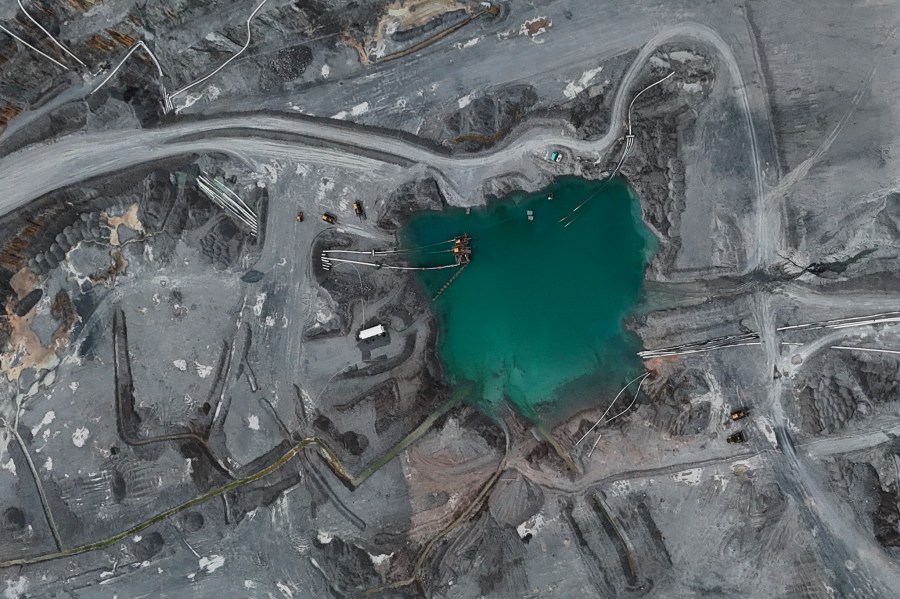 FILE - An aerial view of a sump at the Cobre Panama copper open-pit mine during a press tour of the mine, owned by Canada's First Quantum Minerals, in Donoso, Panama, March 21, 2025. (AP Photo/Matias Delacroix, File)