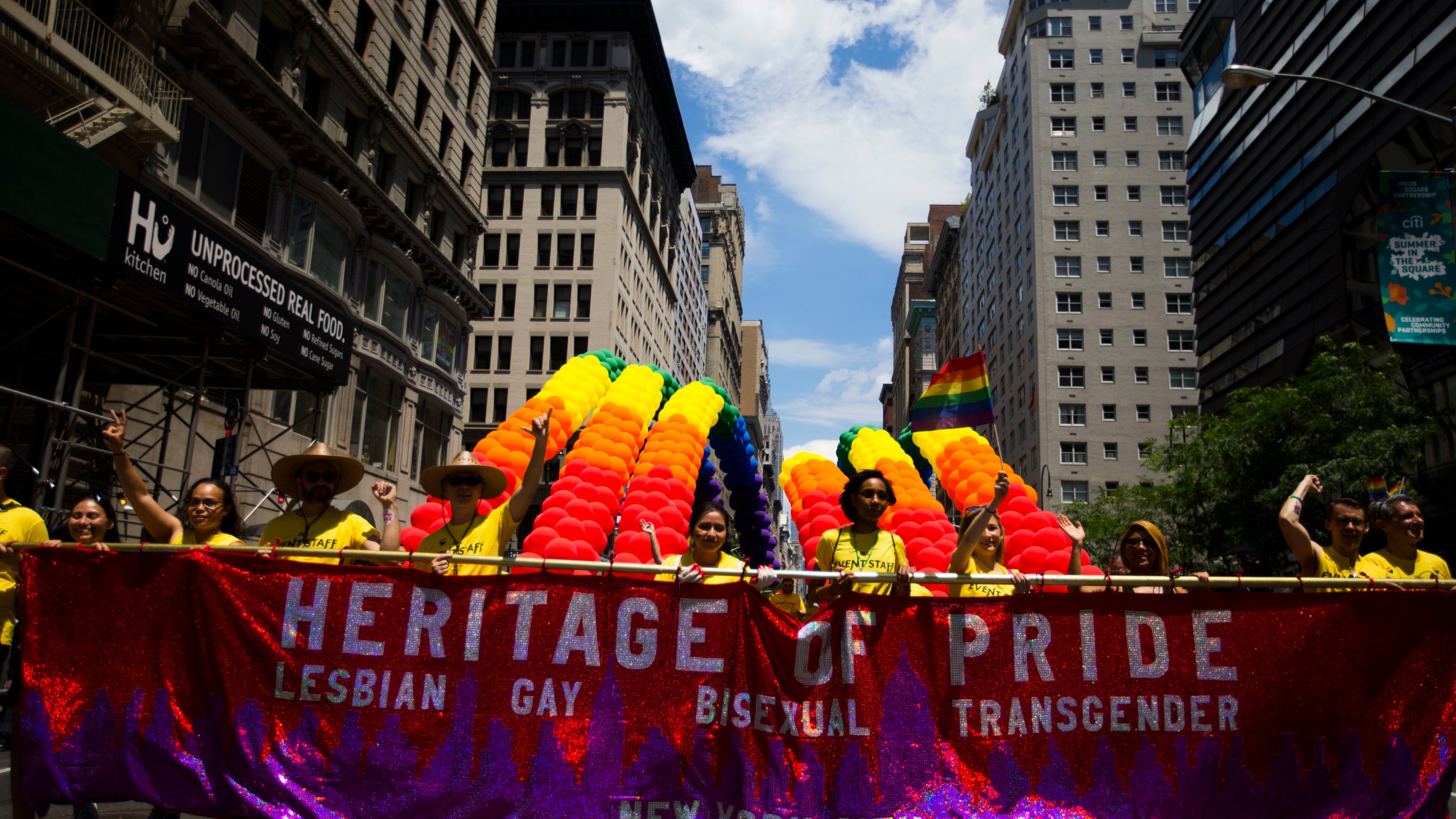 FILE - The Heritage of Pride group carry banners and balloons during the New York City Pride Parade on June 25, 2017 in New York. (AP Photo/Michael Noble Jr., file)