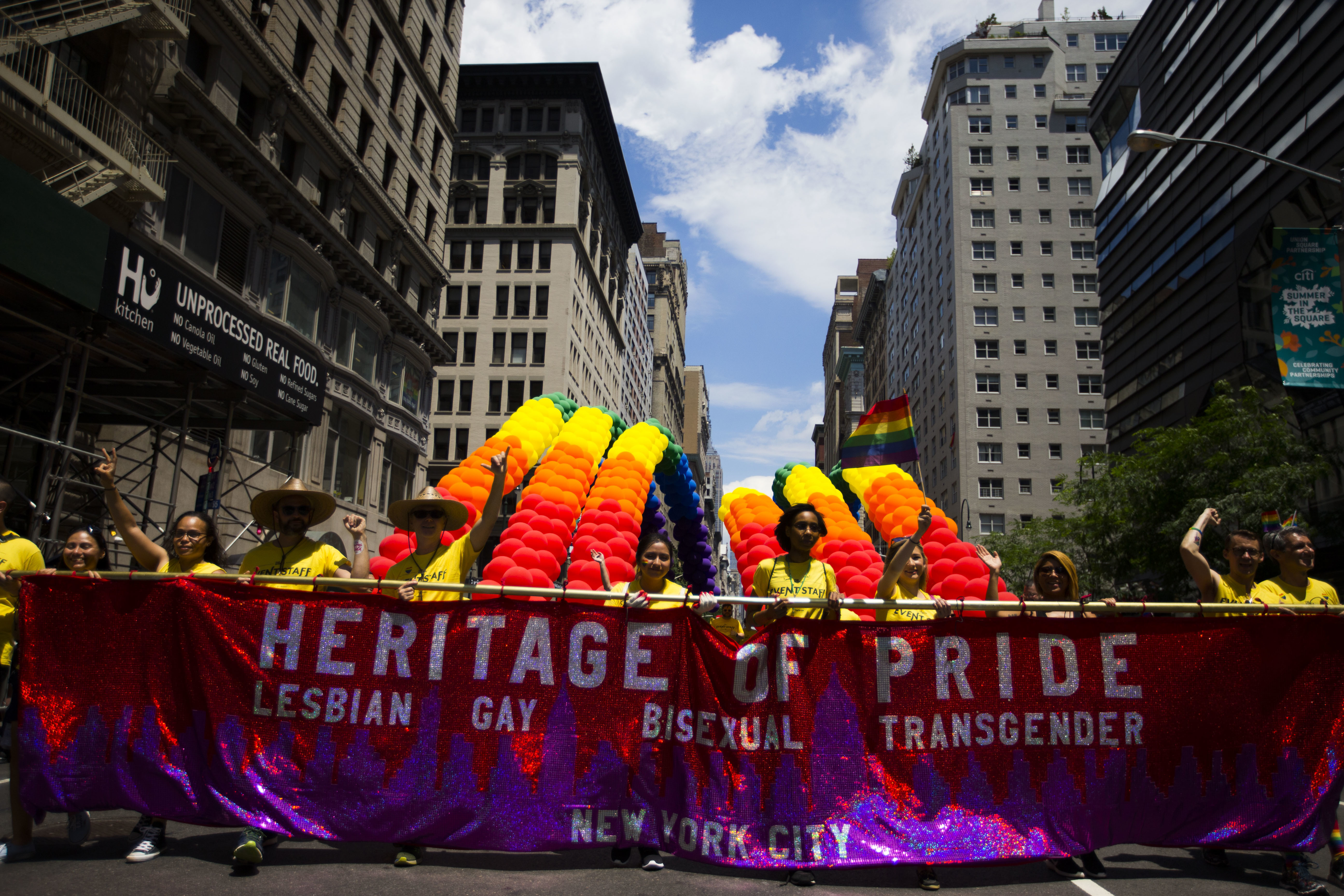 FILE - The Heritage of Pride group carry banners and balloons during the New York City Pride Parade on June 25, 2017 in New York. (AP Photo/Michael Noble Jr., file)
