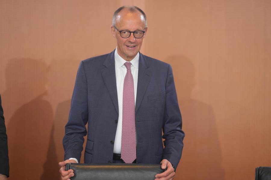 German Chancellor Friedrich Merz arrives for the cabinet meeting at the chancellery in Berlin, Germany, Wednesday, May 28, 2025. (AP Photo/Markus Schreiber)