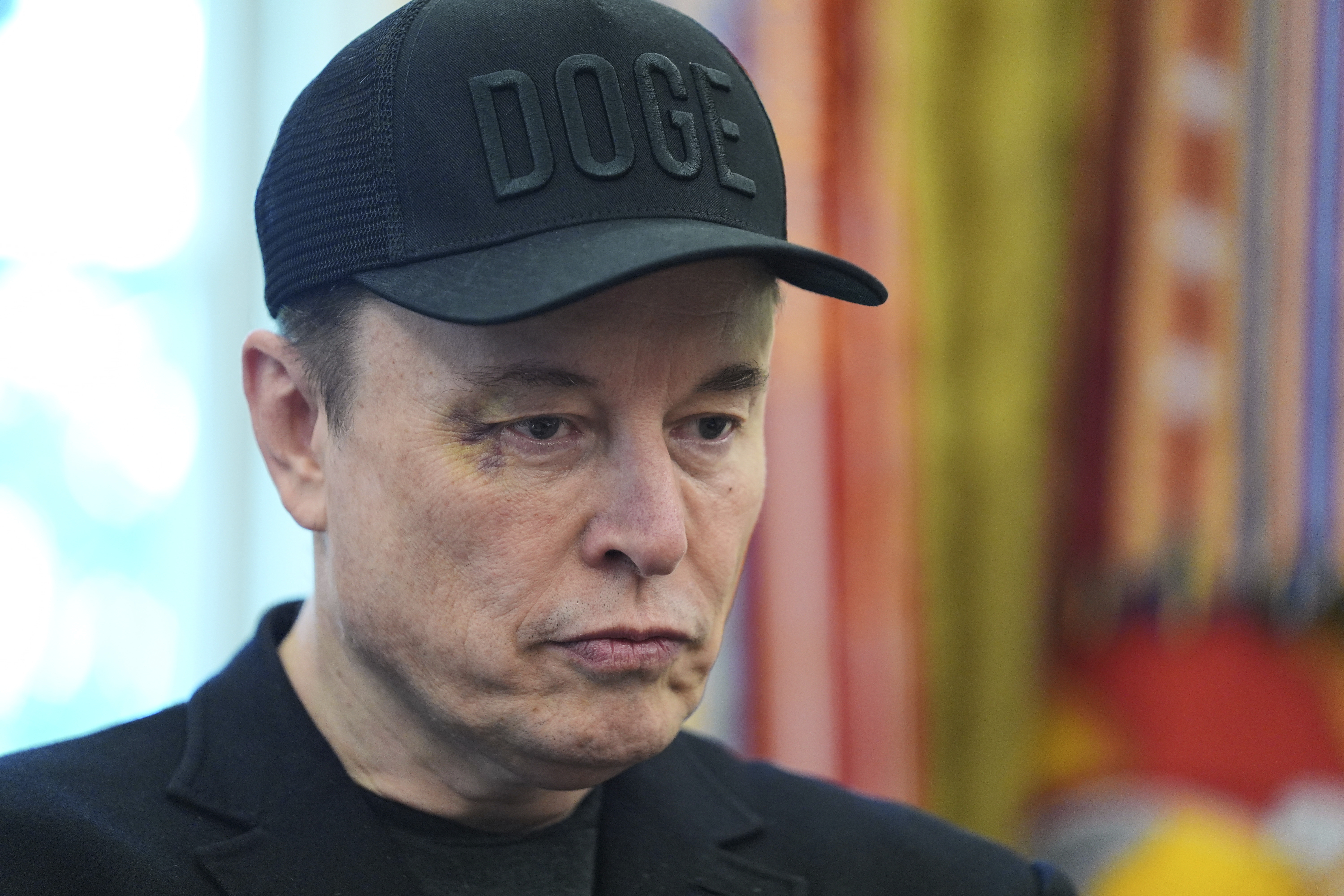 Elon Musk attends a news conference with President Donald Trump in the Oval Office of the White House, Friday, May 30, 2025, in Washington. (AP Photo/Evan Vucci)