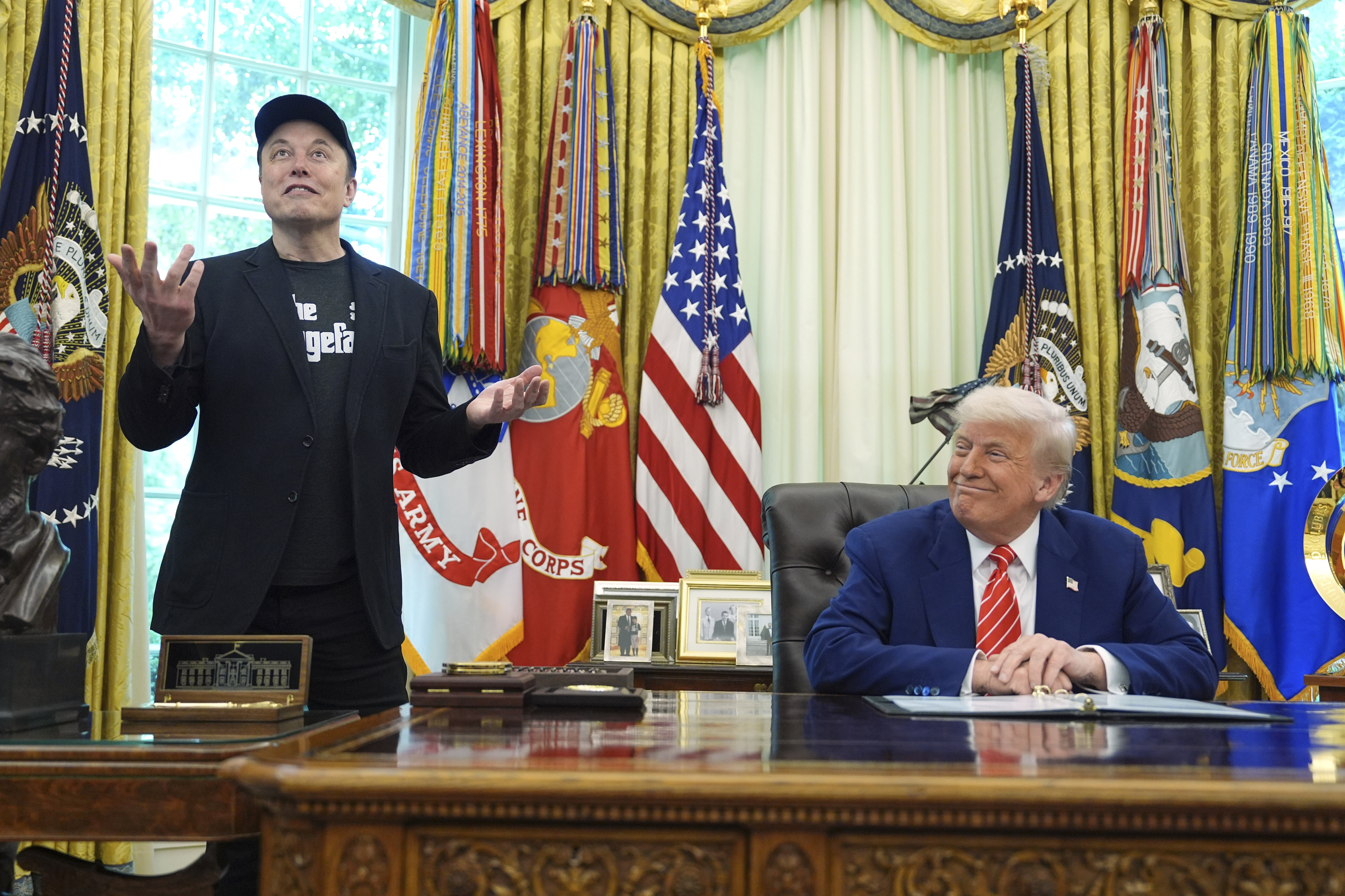 Elon Musk speaks during a news conference with President Donald Trump in the Oval Office of the White House, Friday, May 30, 2025, in Washington. (AP Photo/Evan Vucci)