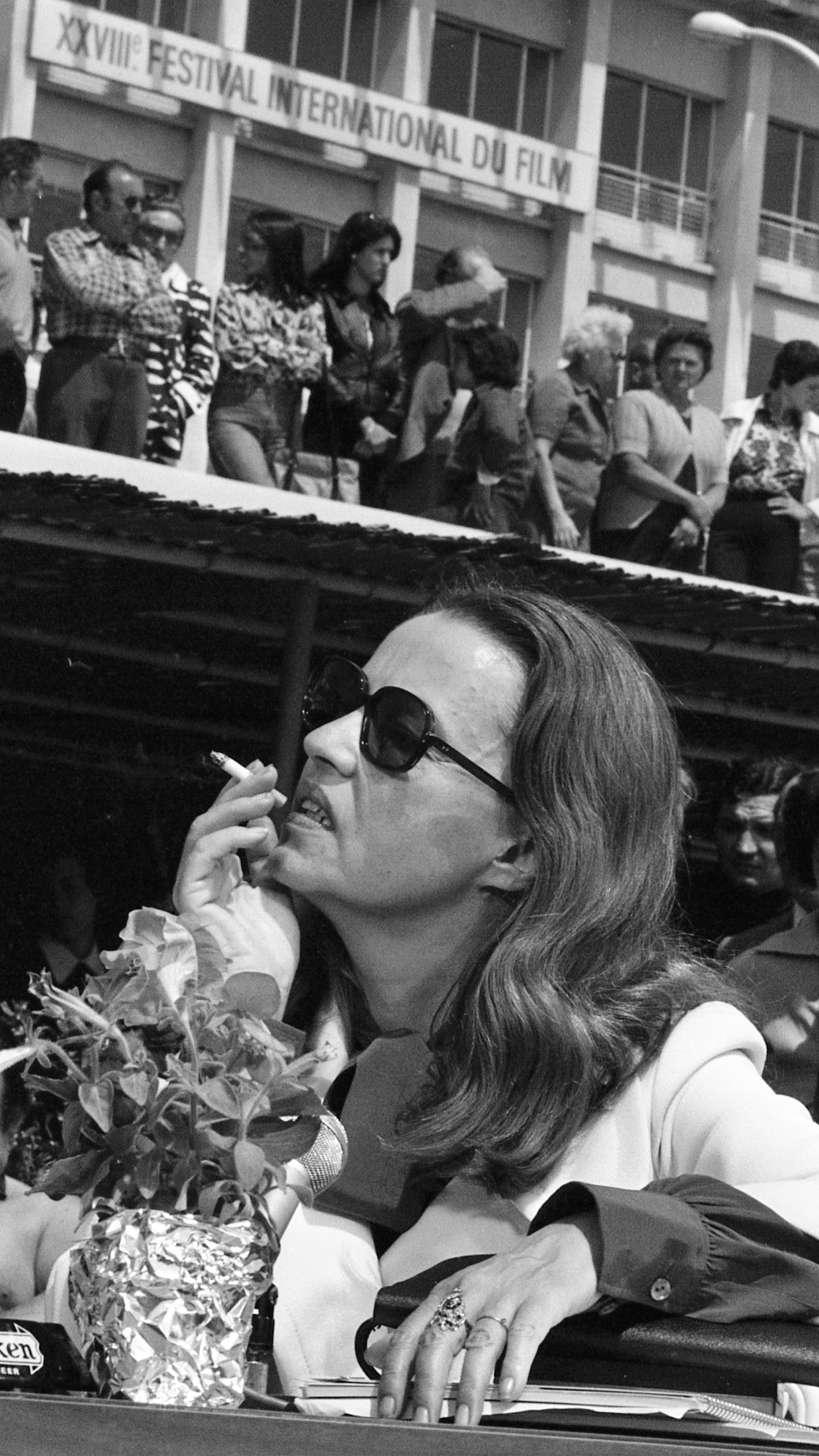 FILE - Jury President Jeanne Moreau smokes a cigarette at the Cannes Film Festival in France on May 12, 1975. (AP Photo, File)