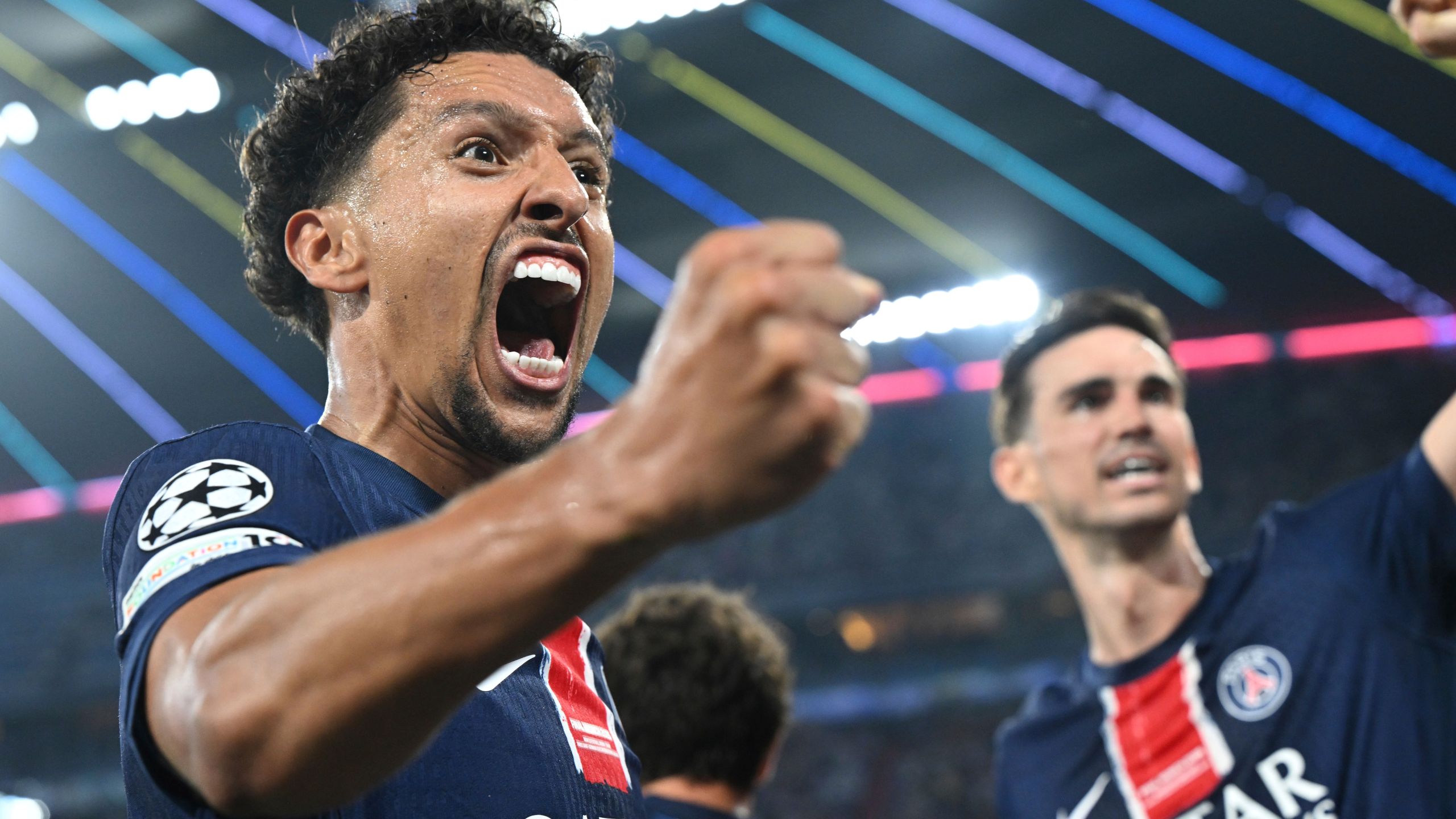 PSG's Marquinhos celebrates during the Champions League final soccer match between Paris Saint Germain and Inter Milan, at the Allianz Arena in Munich, Germany, Saturday, May 31, 2025. (Sven Hoppe/dpa via AP)
