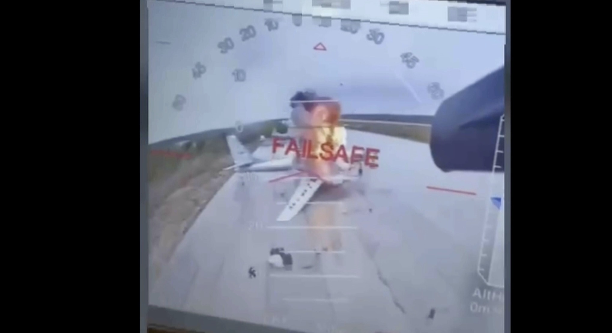 In this image taken from video released June 1, 2025, by a source in the Ukrainian Security Service shows a Ukrainian drone striking Russian planes deep in Russia's territory. (Source in the Ukrainian Security Service via AP)