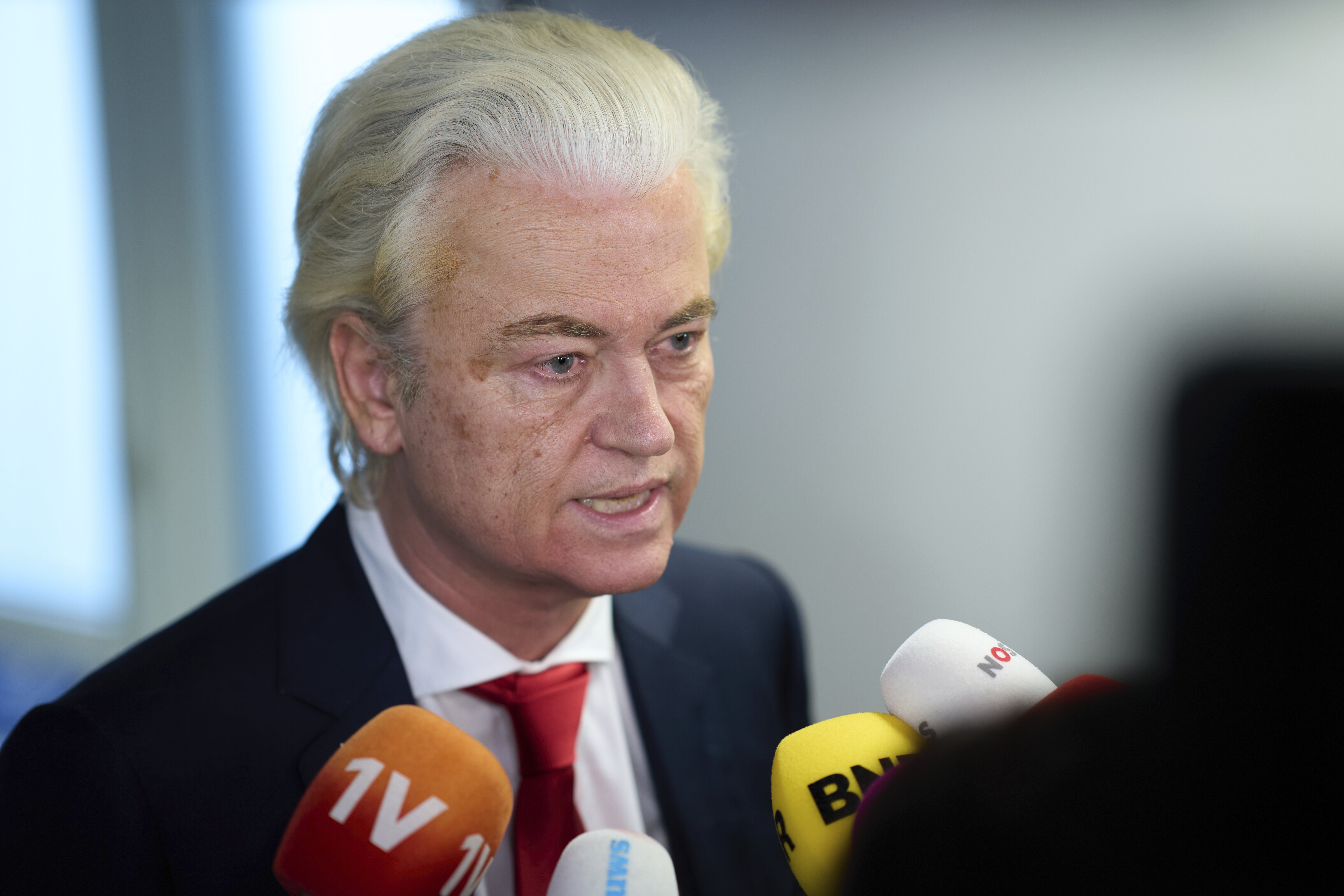 Far-right lawmaker Geert Wilders talks to the media after pulling his party out of the four-party Dutch coalition in The Hague, Netherlands, Tuesday, June 3, 2025. (AP Photo/Peter Dejong)