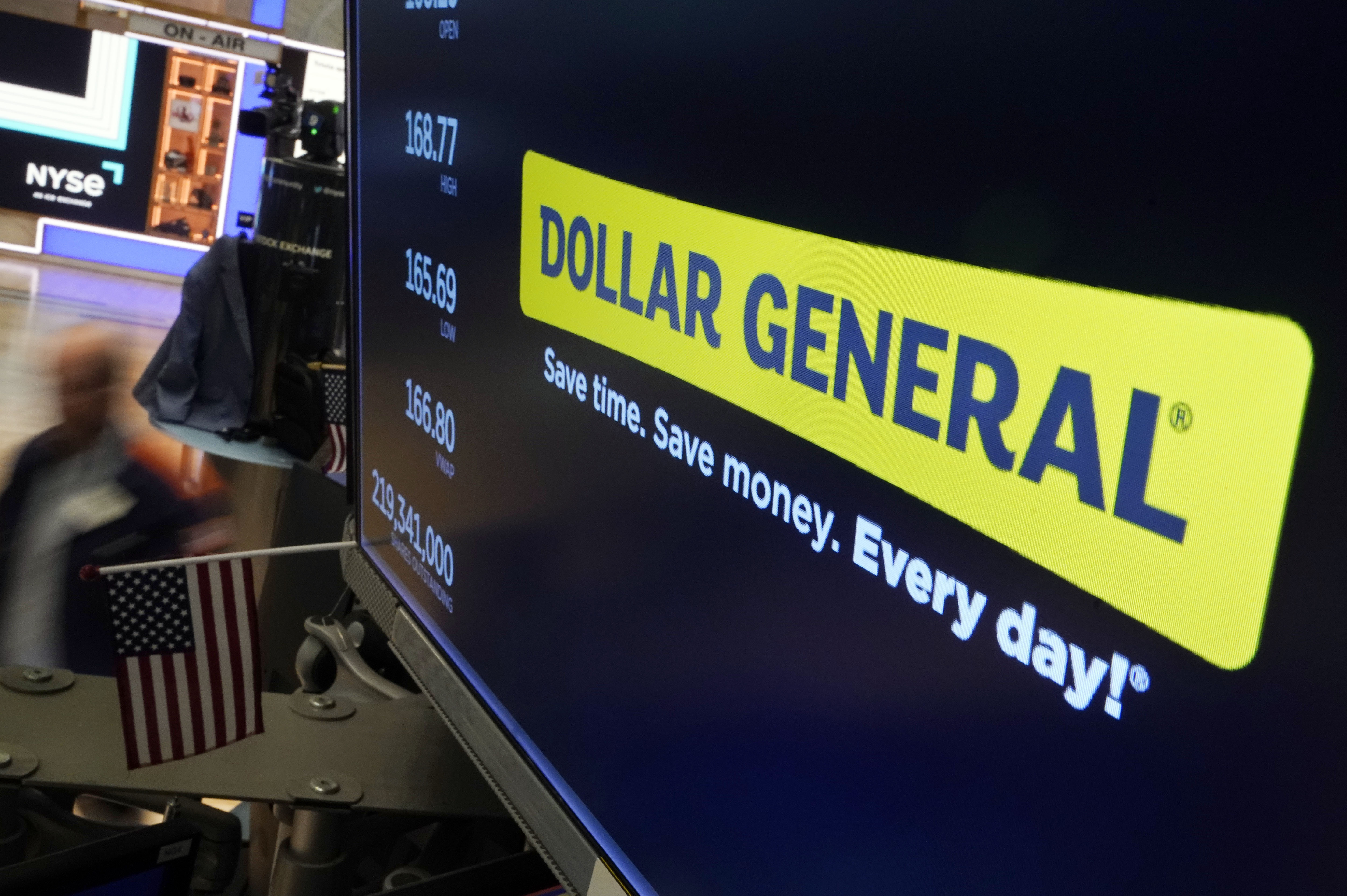 FILE - The logo for Dollar General appears on a screen above a trading post on the floor of the New York Stock Exchange, July 13, 2023. (AP Photo/Richard Drew, File)