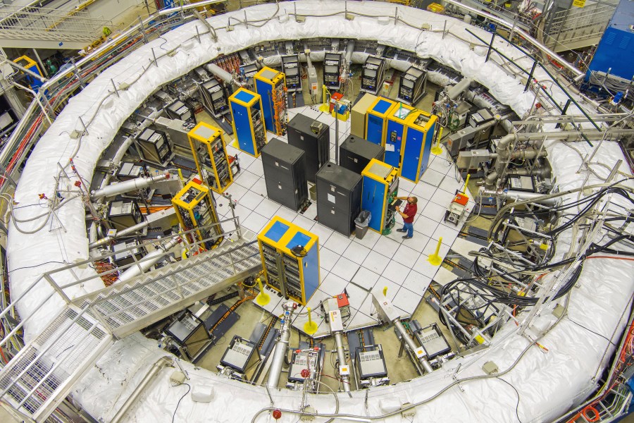 This image provided by the Fermi National Accelerator Laboratory shows the ring-shaped track that scientists used to study tiny particles called muons, July 20, 2023 in Batavia, Ill. (Ryan Posteland/Fermi National Accelerator Laboratory via AP)